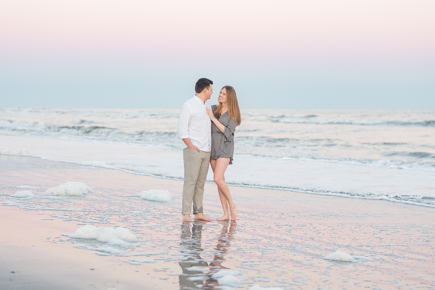 sunset beach engagement couple