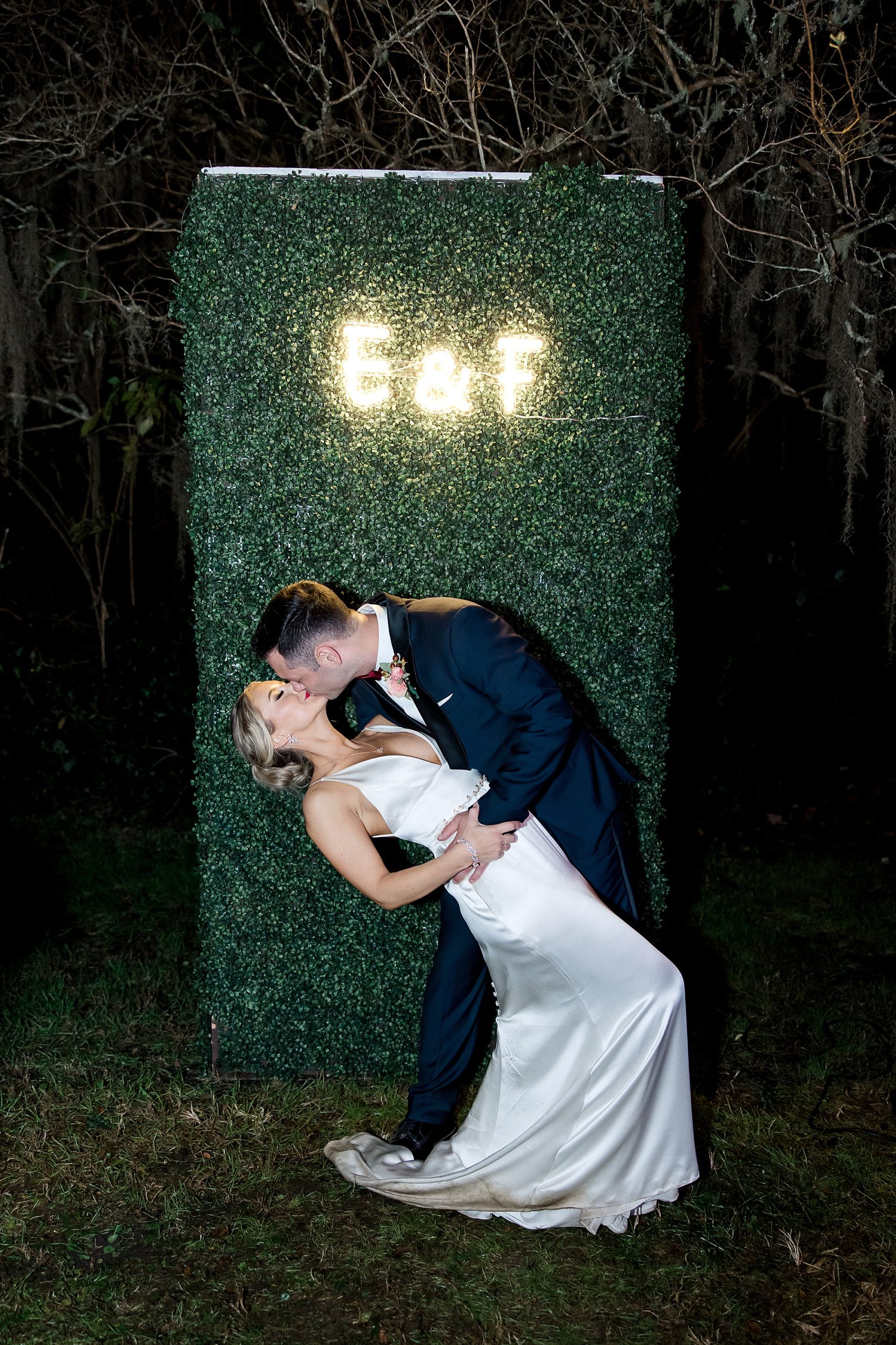 newlyweds kiss at the end of their Magnolia Plantation and Gardens Wedding