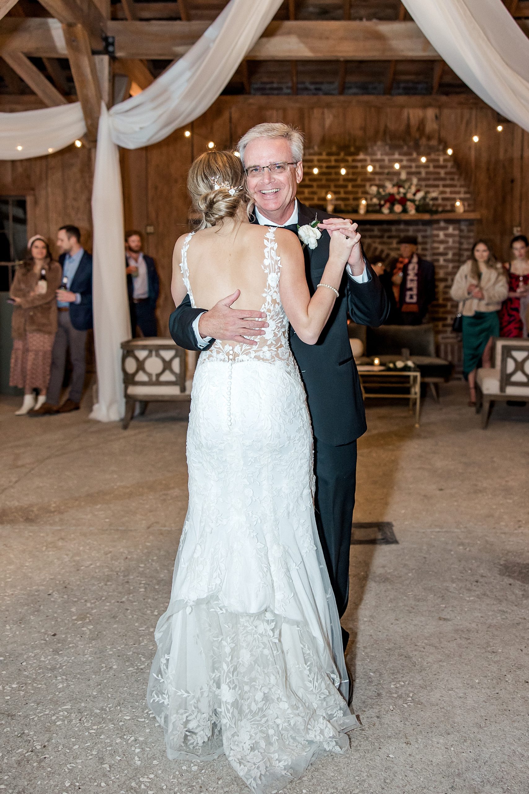 bride shares dance with her dad