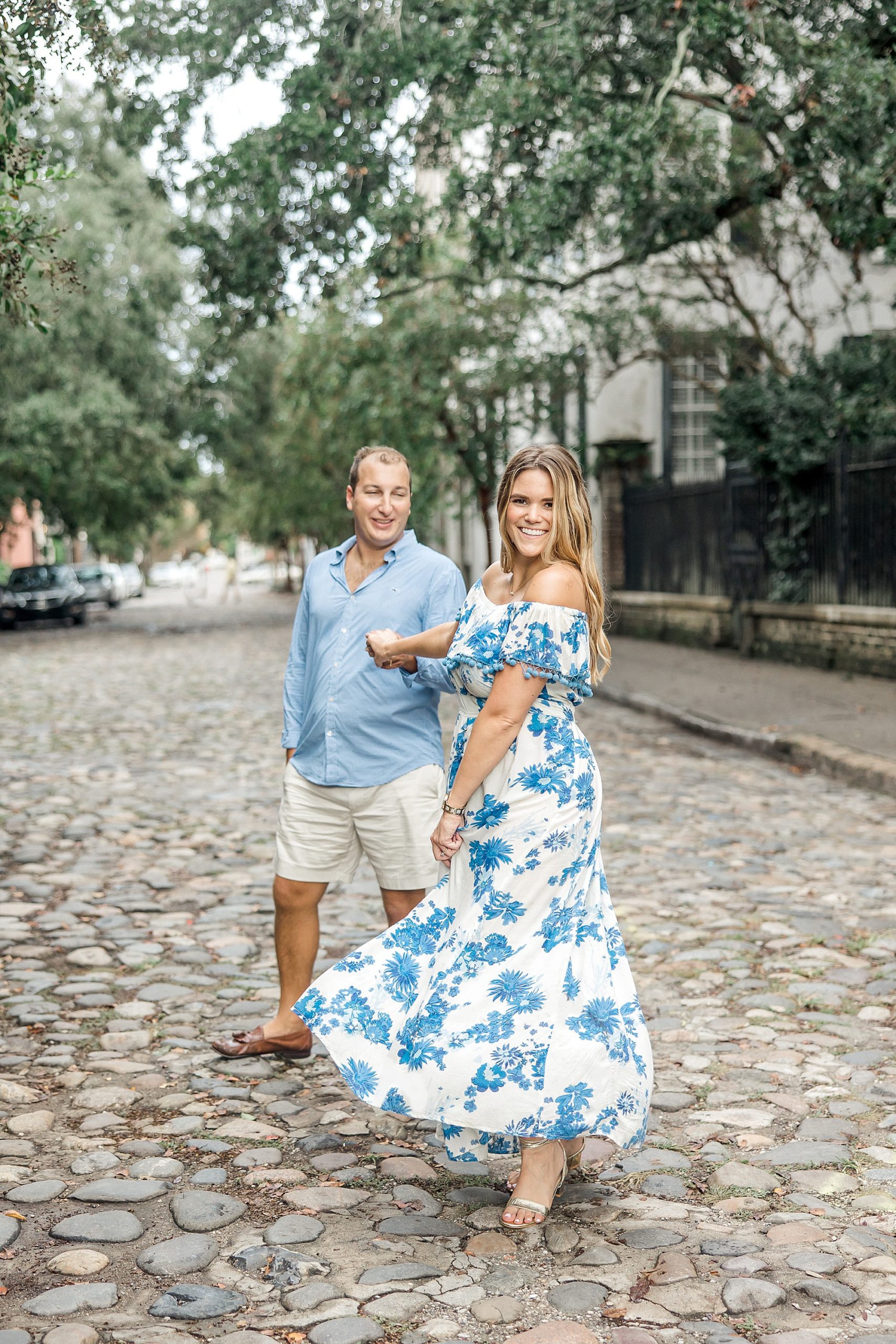couple in the street during Charleston SC engagement session