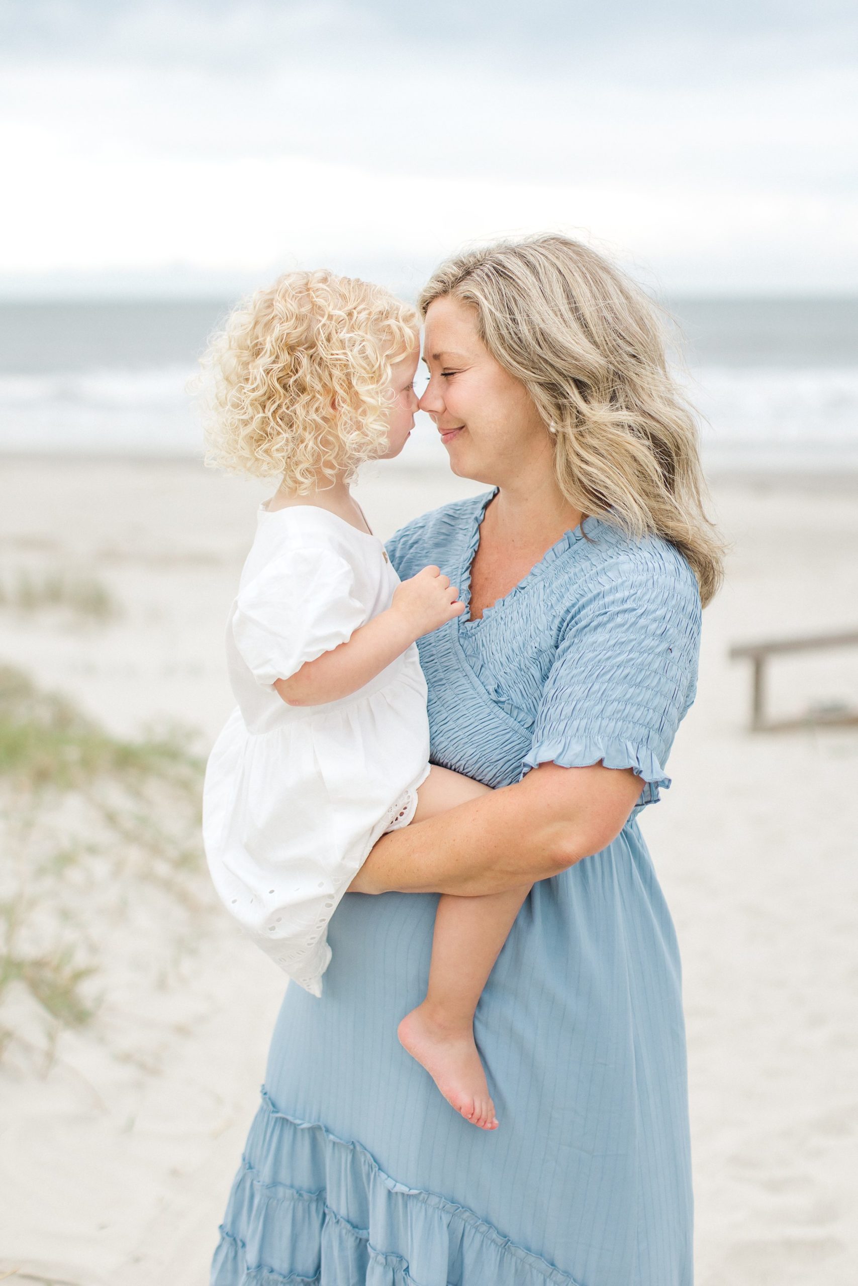 Mother and daughter hug on Kiawah Island South Carolina