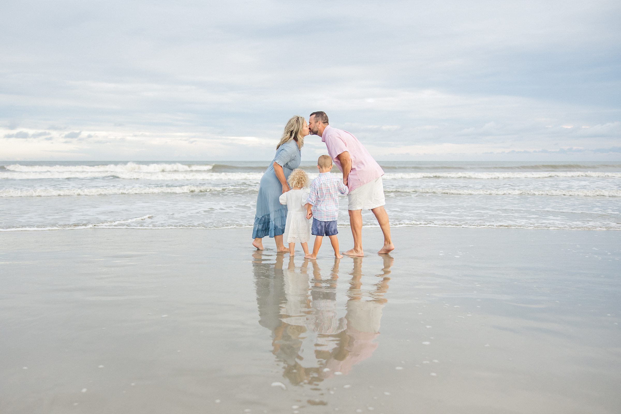 Family plays on the beach of Kiawah Island South Carolina