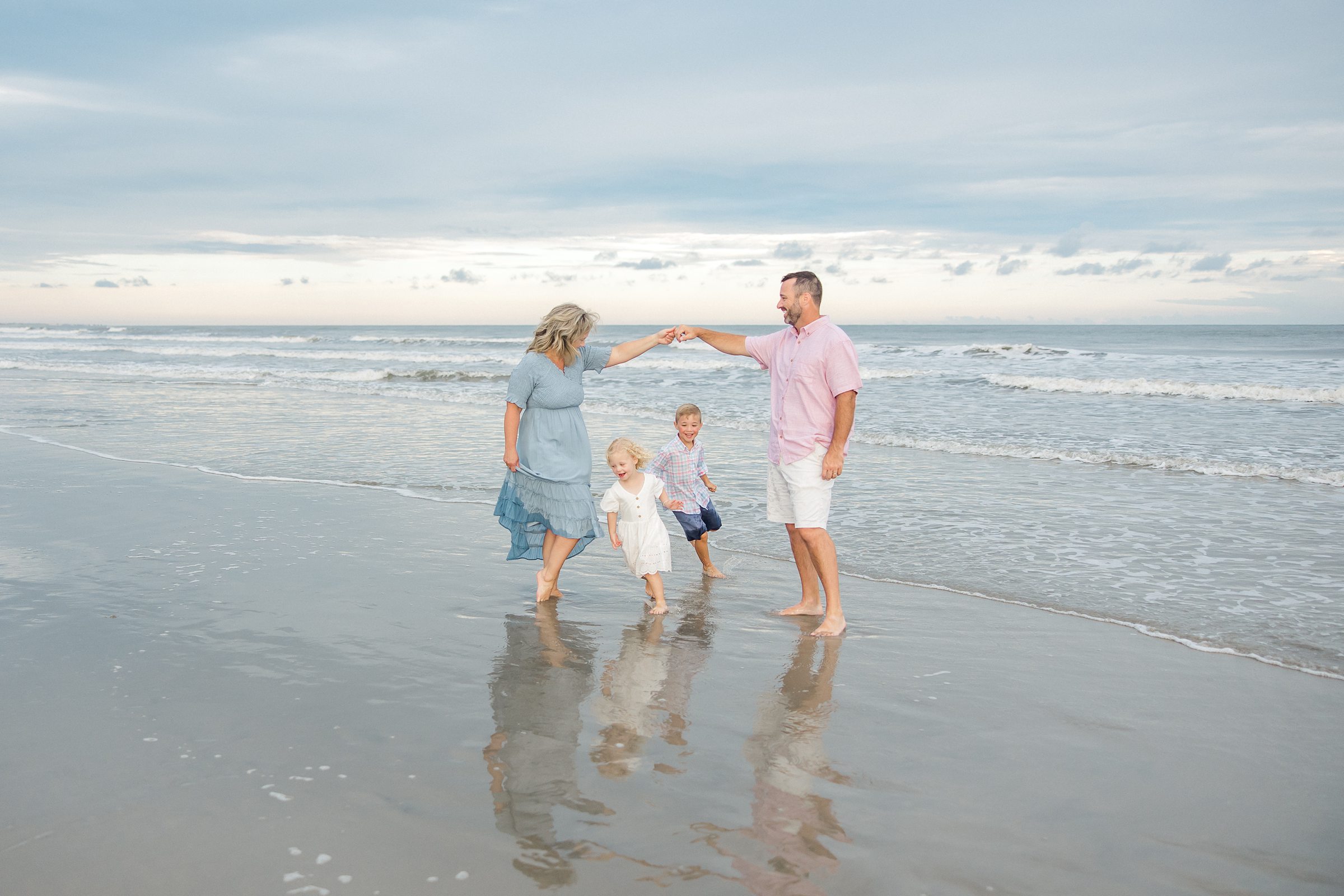 Family plays on Charleston beach