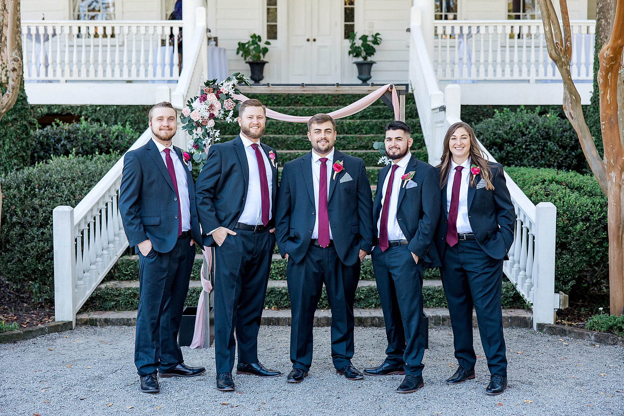 Groom and Groomsmen stand together before wedding ceremony
