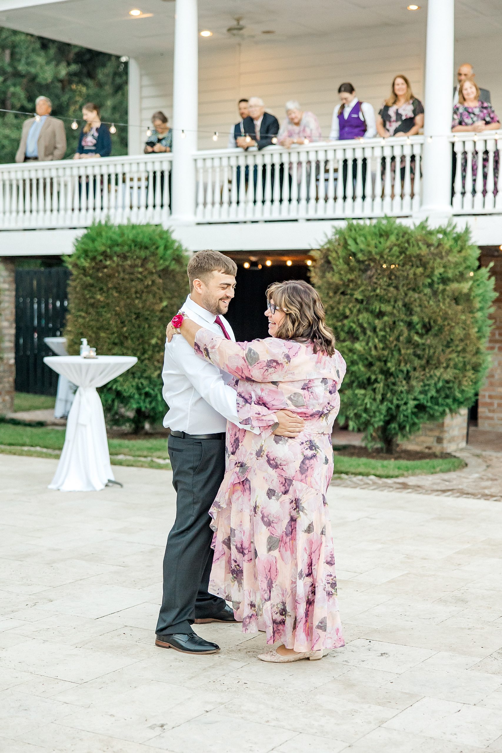 mother and son dance together during Old Wide Awake Plantation wedding