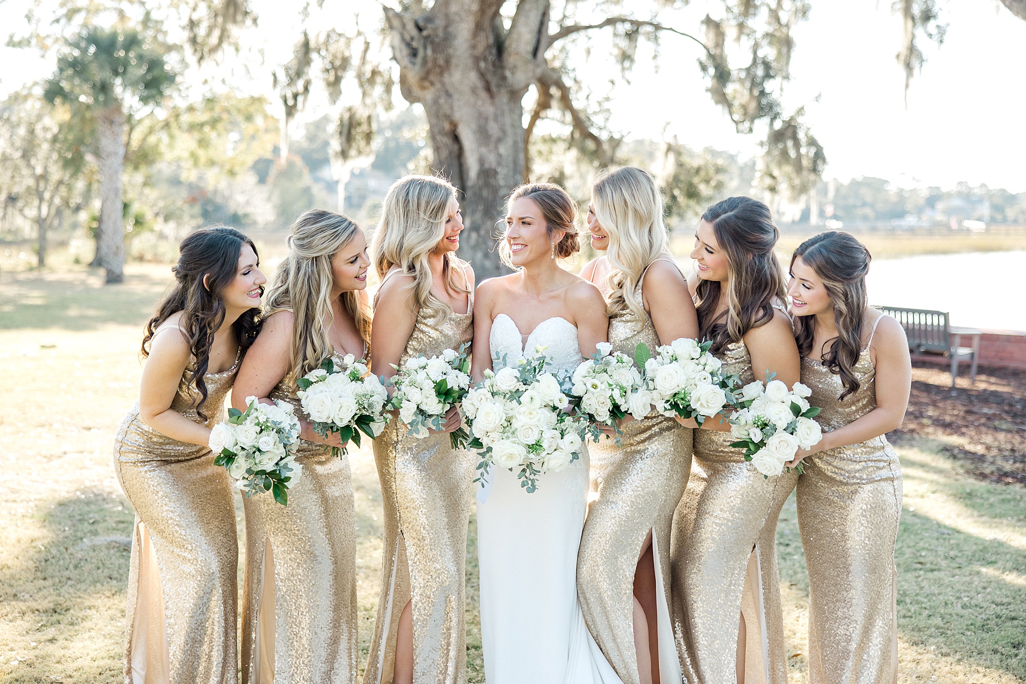 bridesmaids gather around bride before Romantic South Carolina Wedding ceremony
