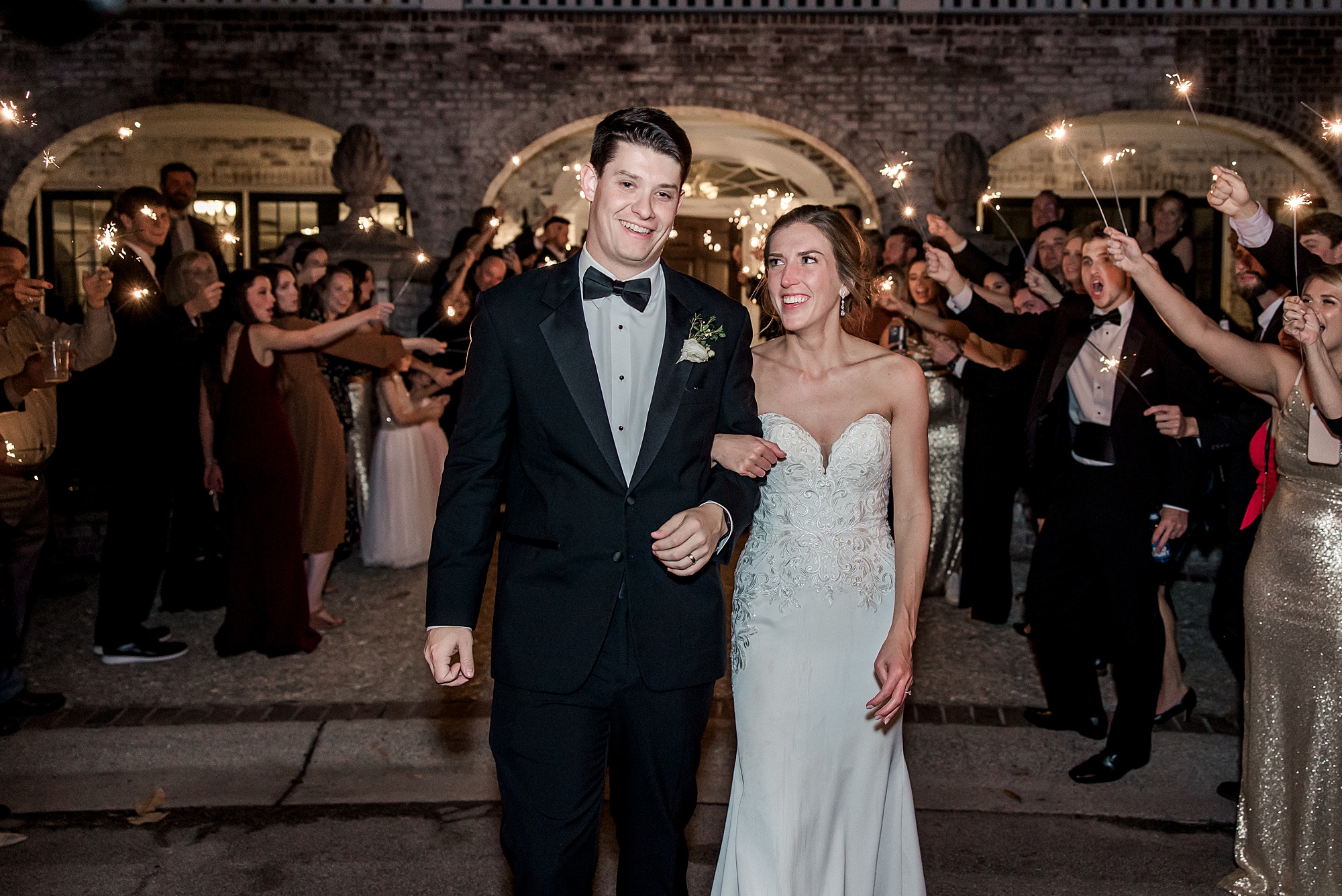 Bride and groom exit their Romantic South Carolina Wedding reception