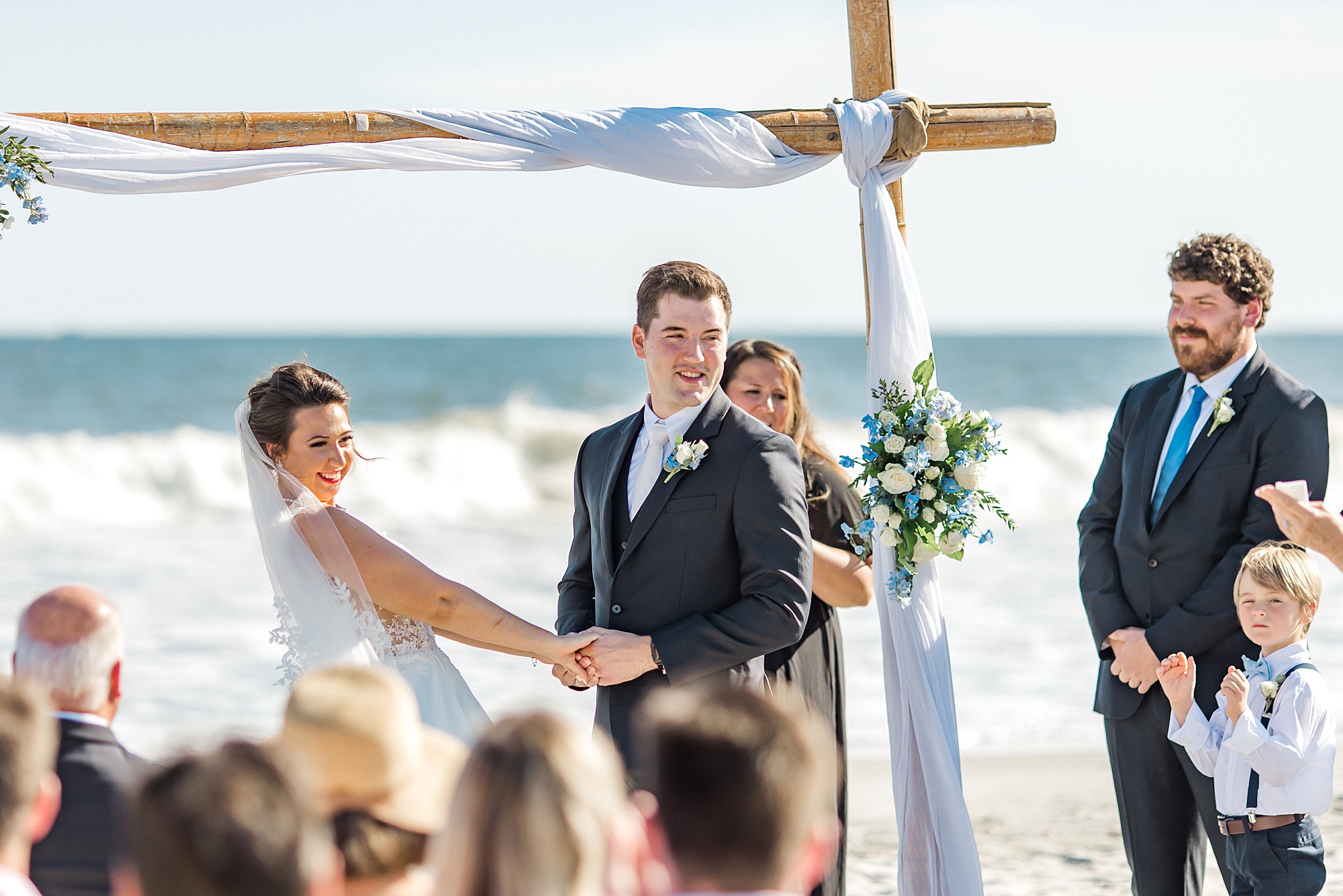 couple exchange wedding vows on the beach in NC