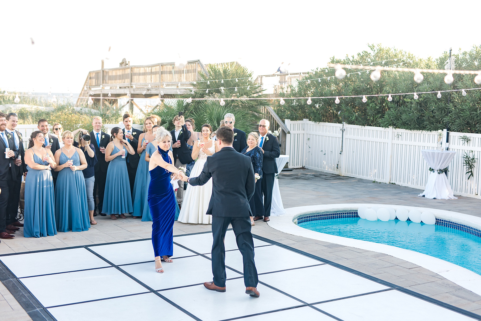 groom dances with his mom at reception