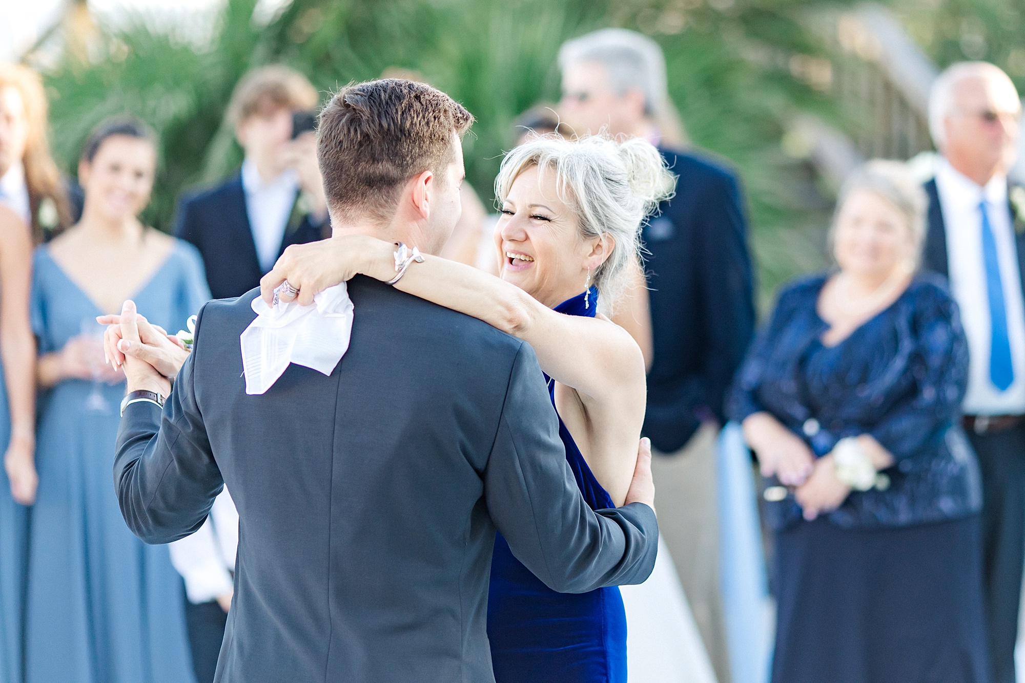 mother-son dance at beach wedding reception