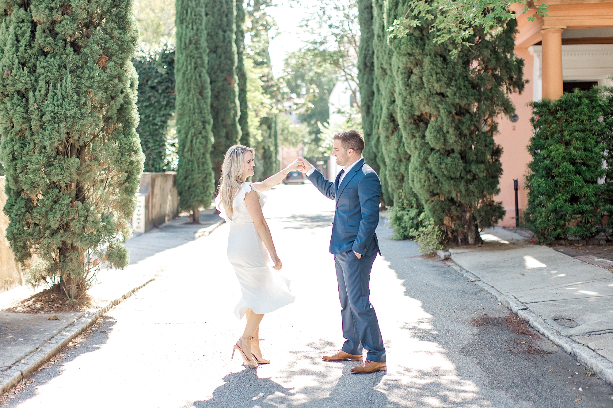newly engaged couple in downtown Charleston for engagement portraits