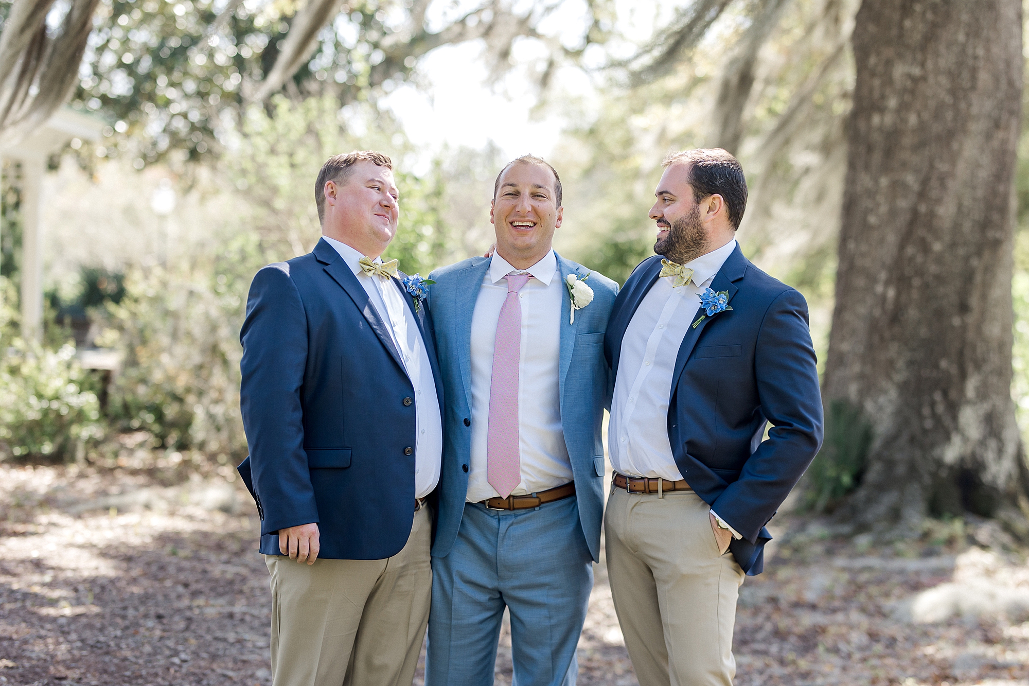 groom with his two best mans