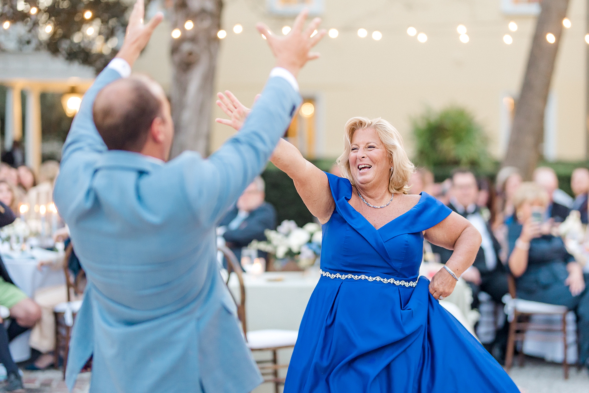 groom and his mom dance together