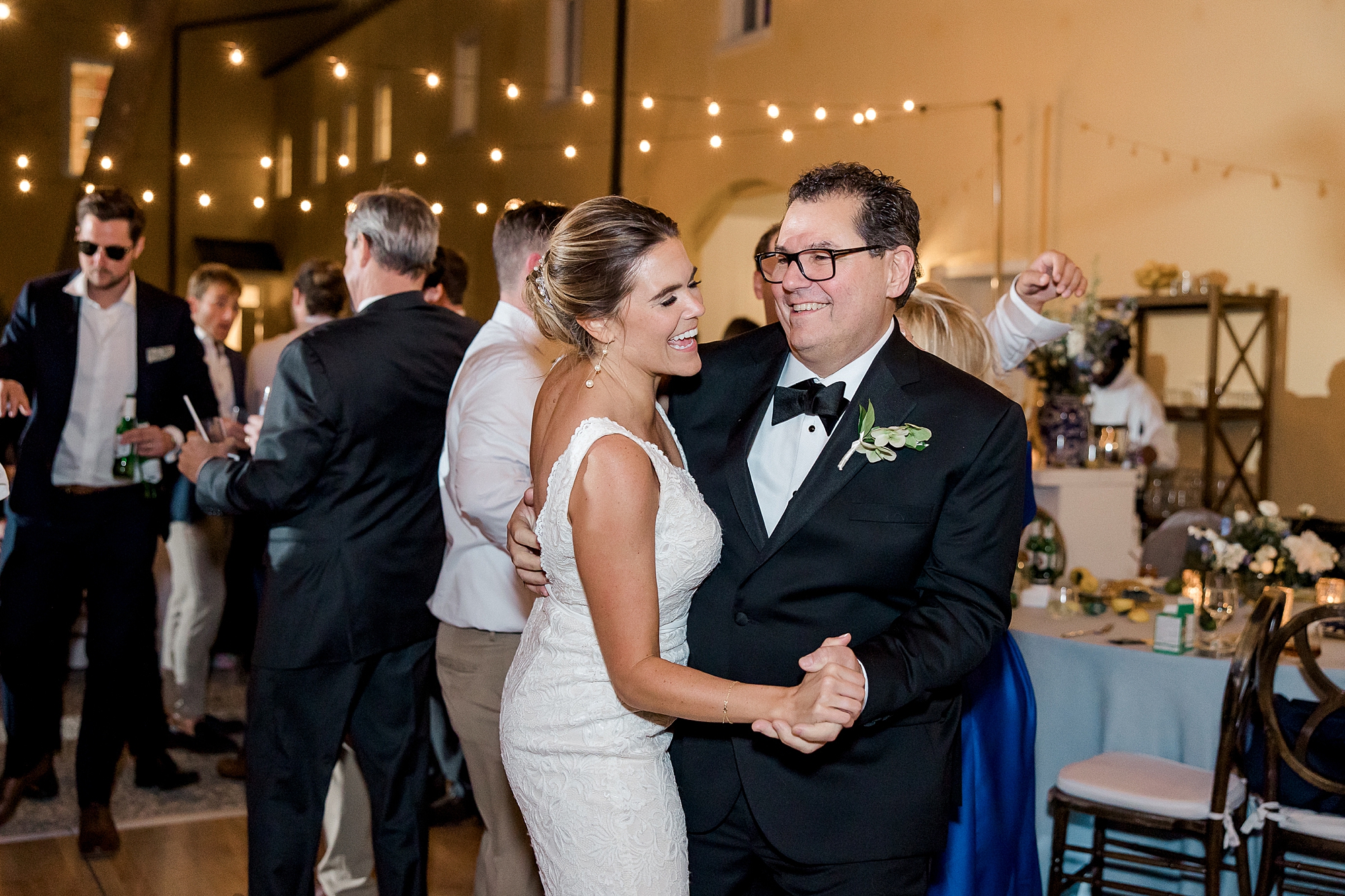bride and her father dance during reception