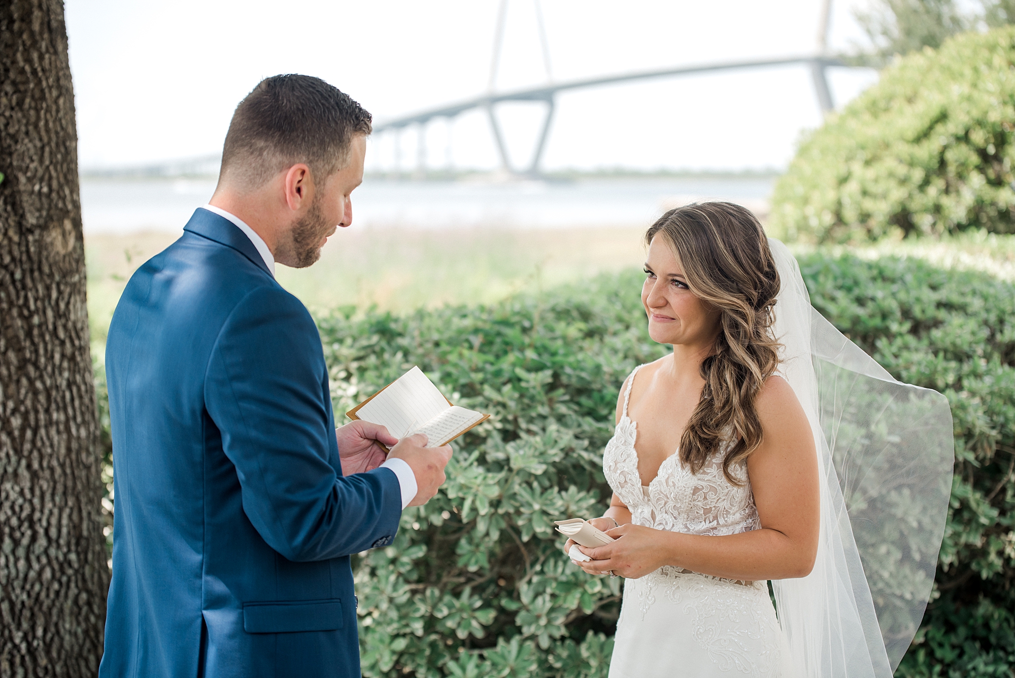 groom reads his private vows to his bride