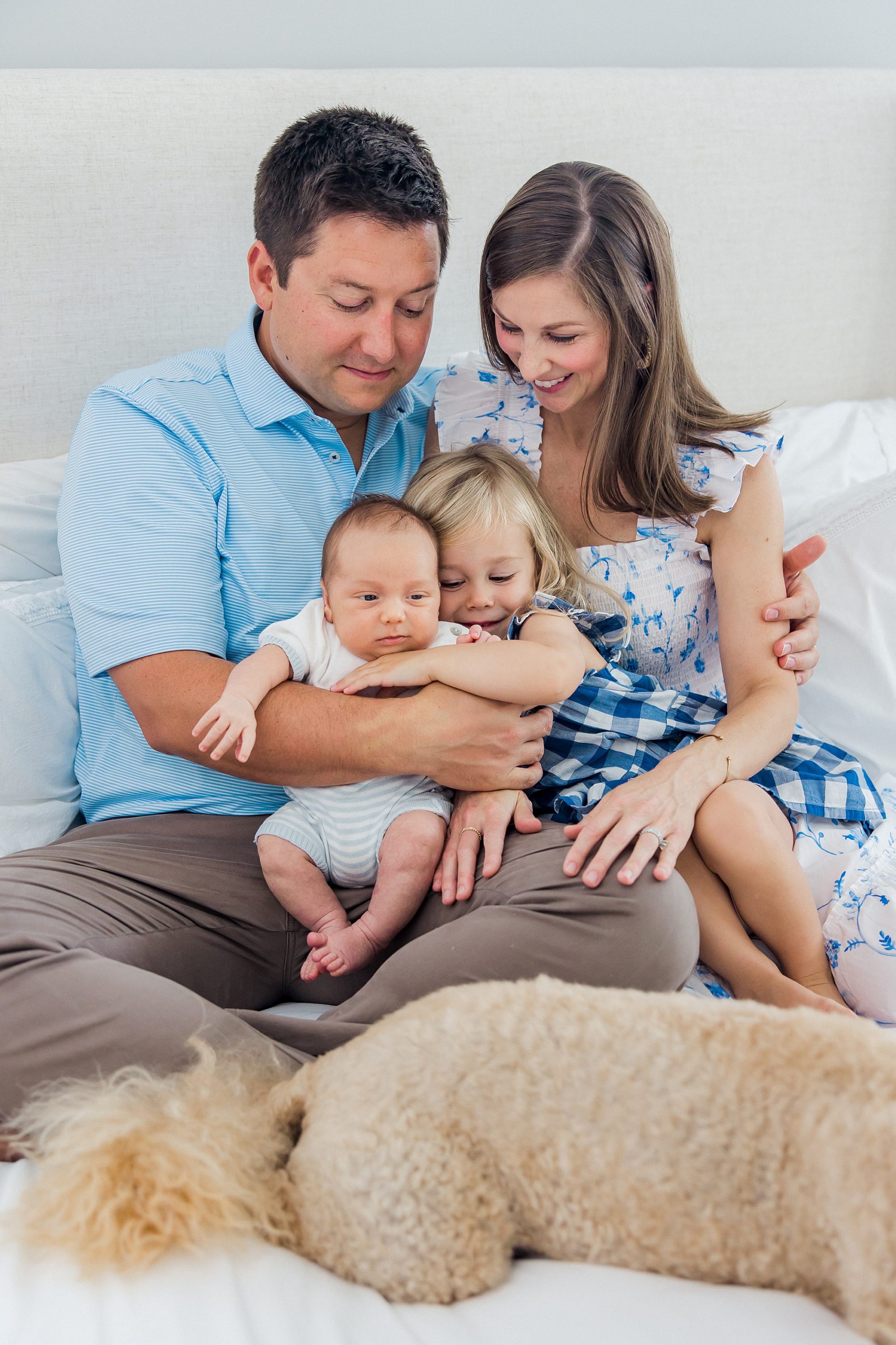 lifestyle newborn session in home of new family of four