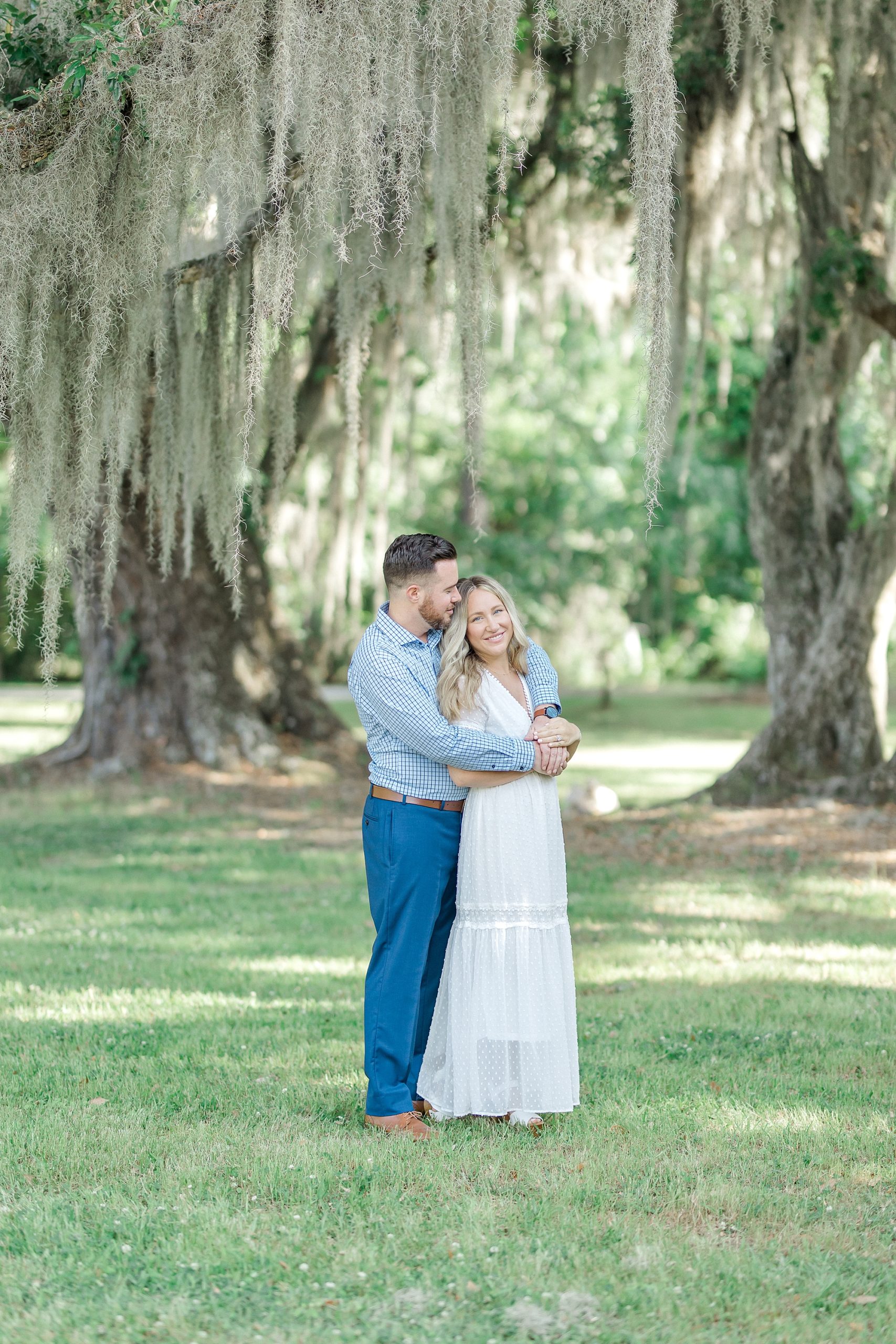 romantic Charleston Engagement under the ancient oak trees