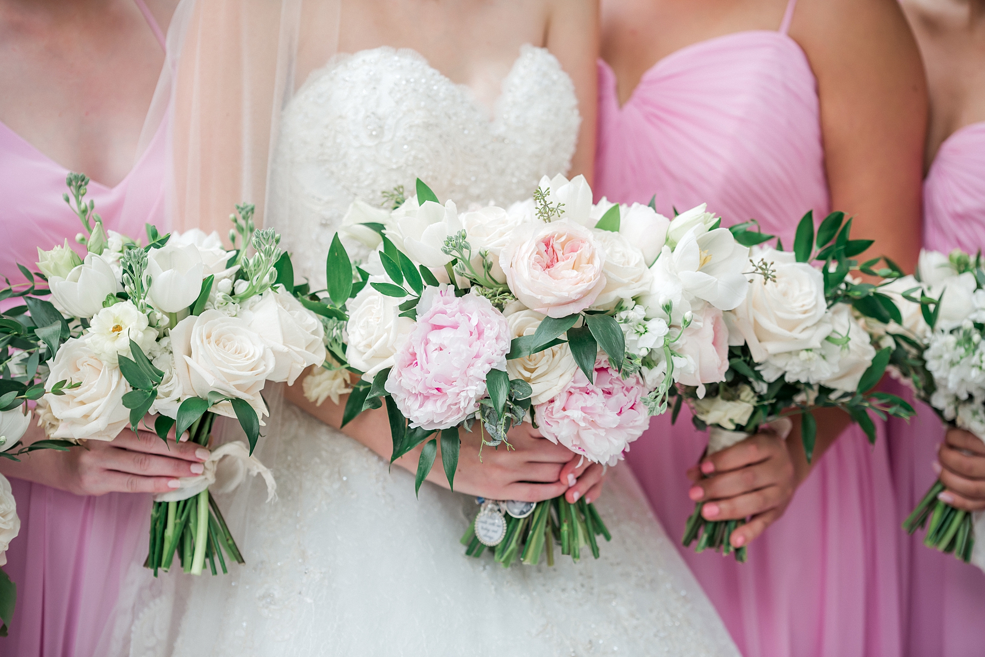 white and light pink flower wedding bouquet