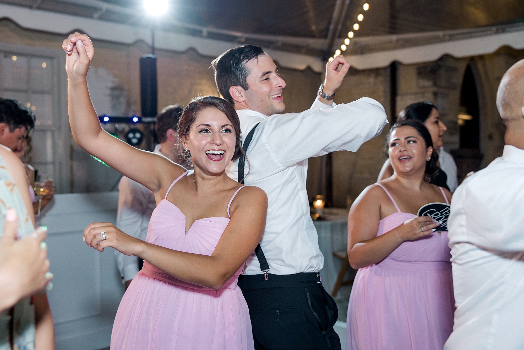 bridesmaids and groomsmen dance at Charleston reception