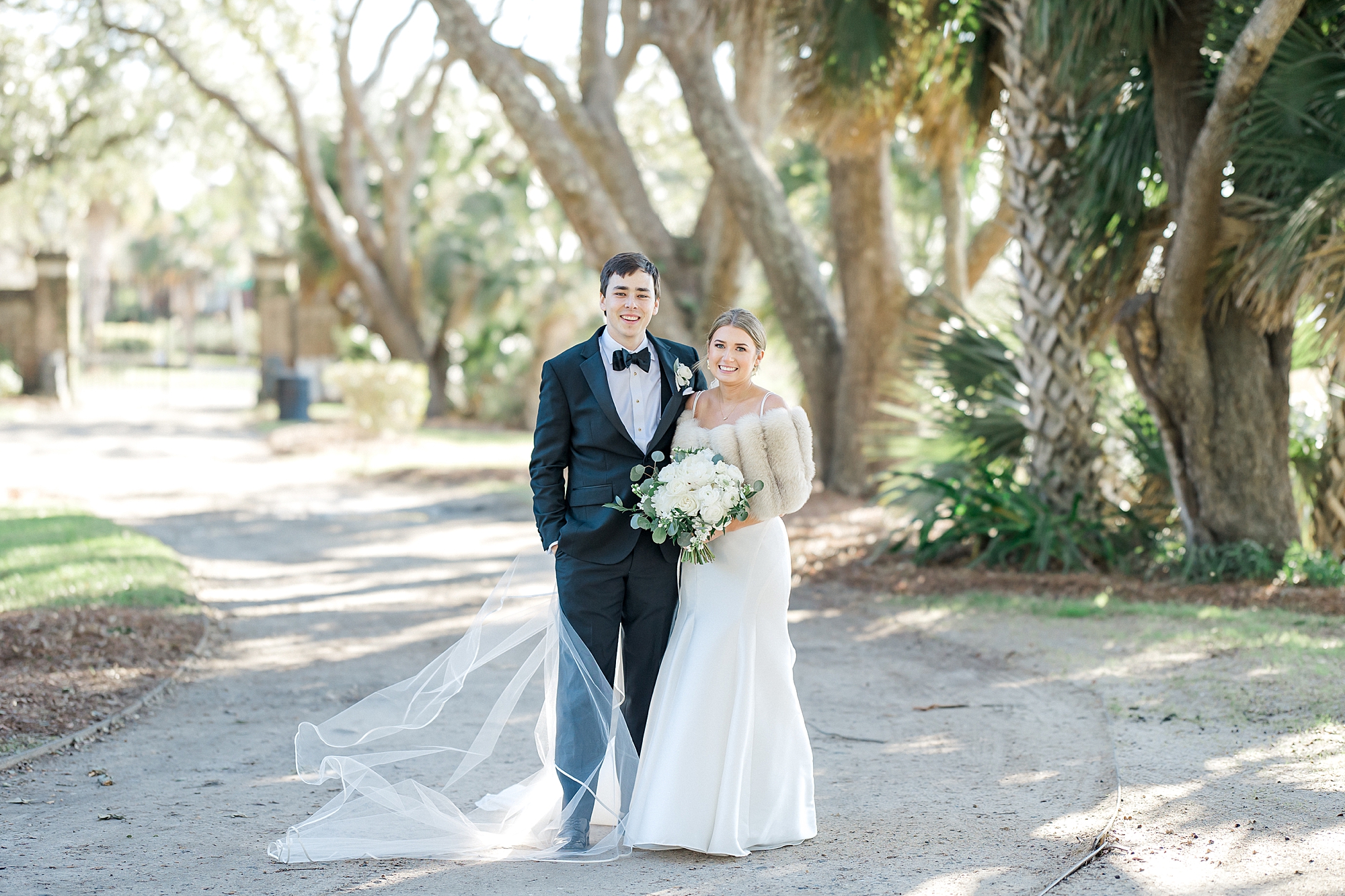 couple under live oaks in Lowndes Grove