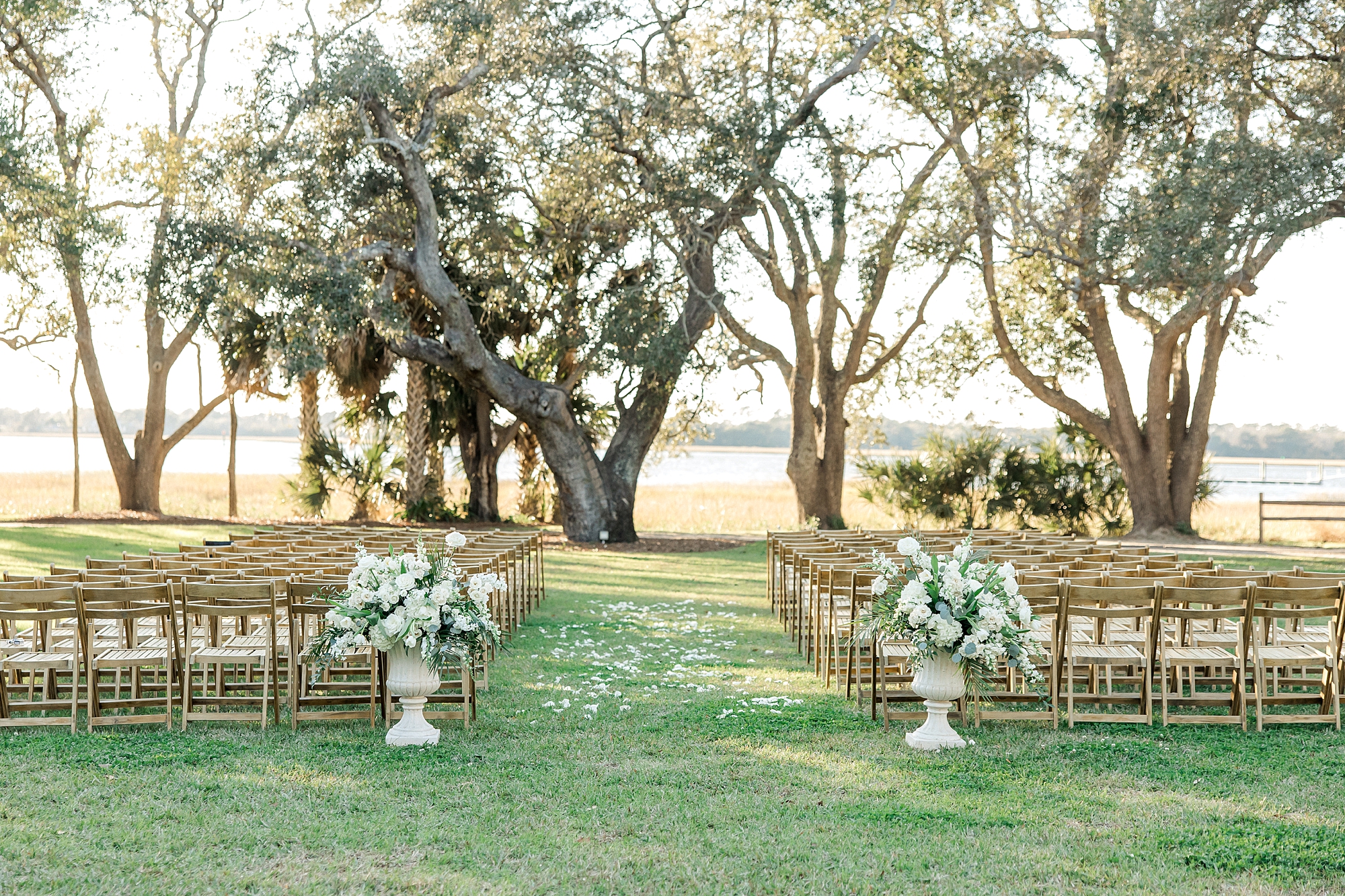 winter wedding ceremony under live oaks at Lowndes Grove