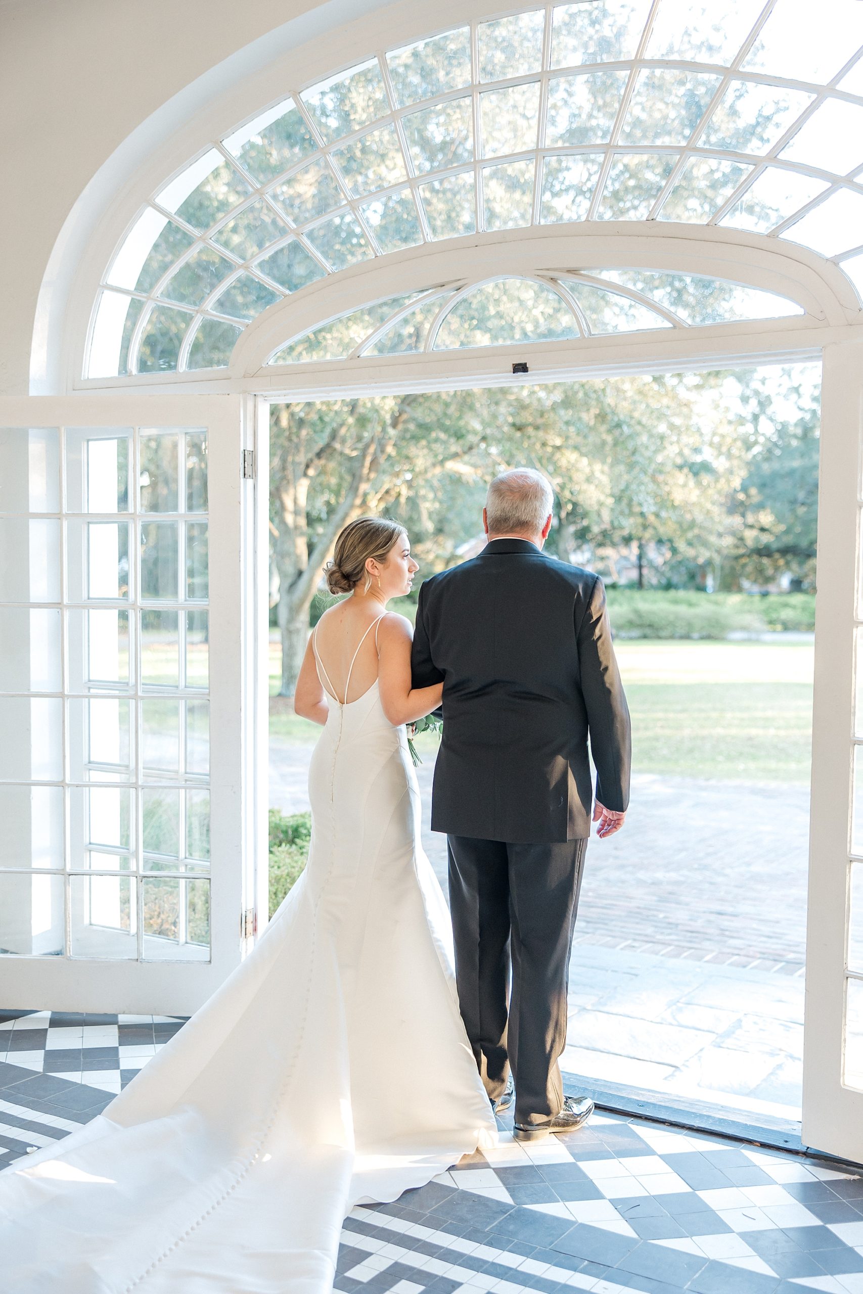 bride and father moments before walking down the aisle