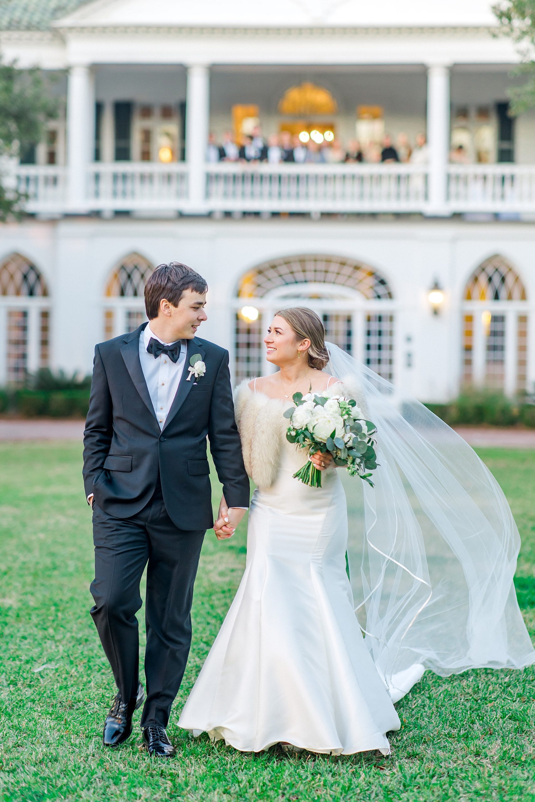 wedding portraits on the grounds of Lowndes Grove in Charleston