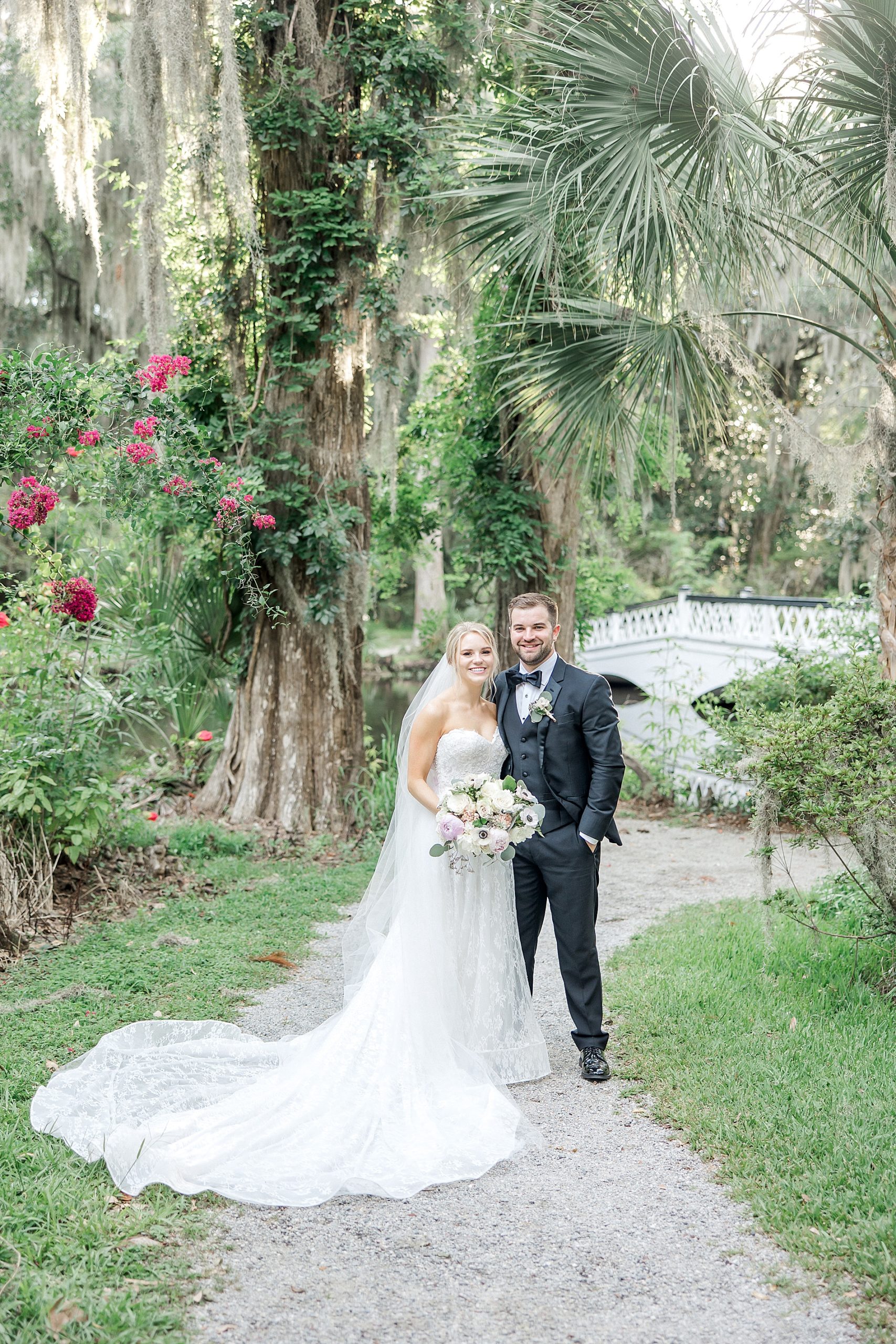 newlyweds after Summer Carriage House Wedding in Charleston