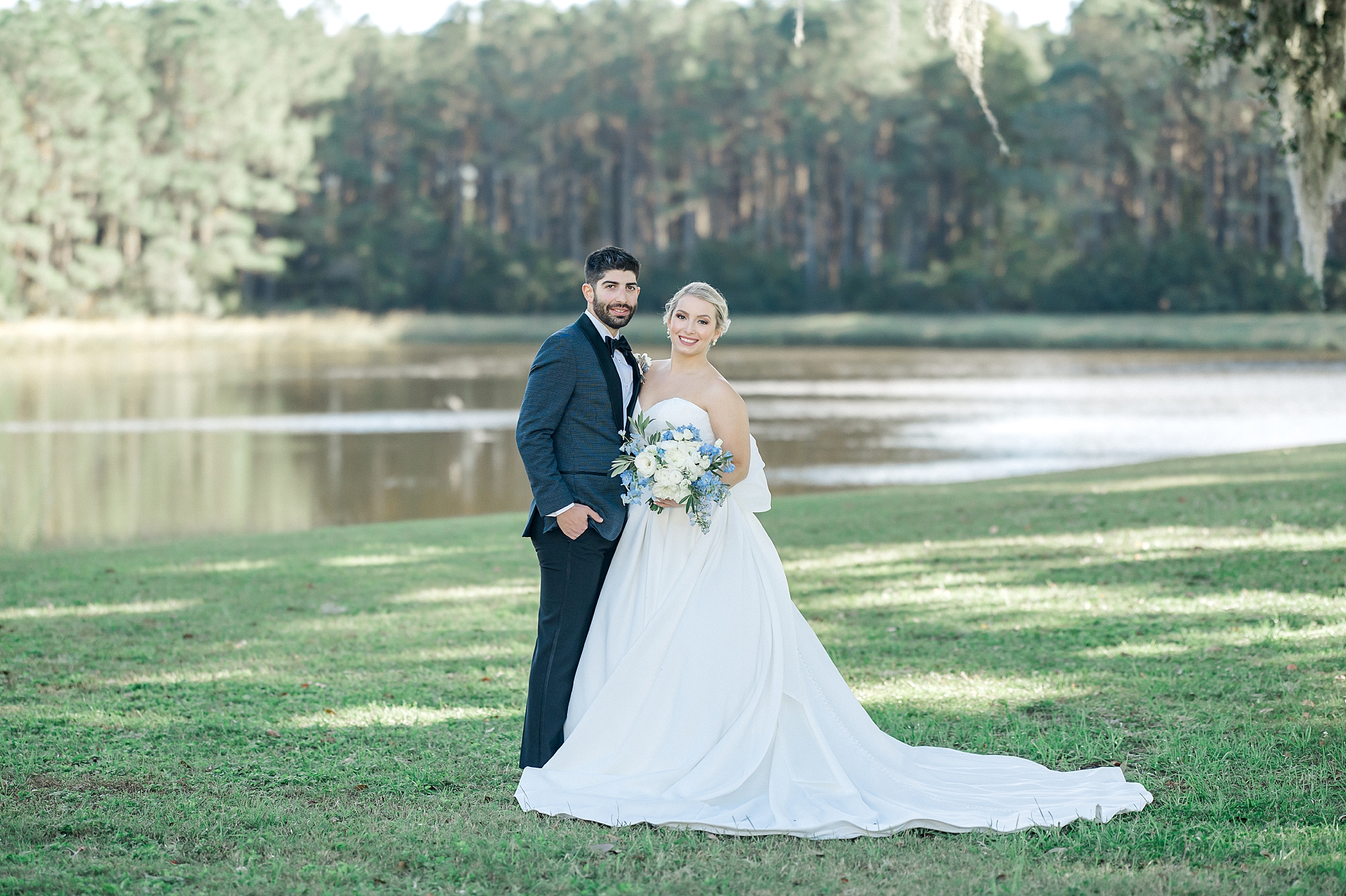 bride and groom portraits by pond at Wingate Place in Charleston, SC