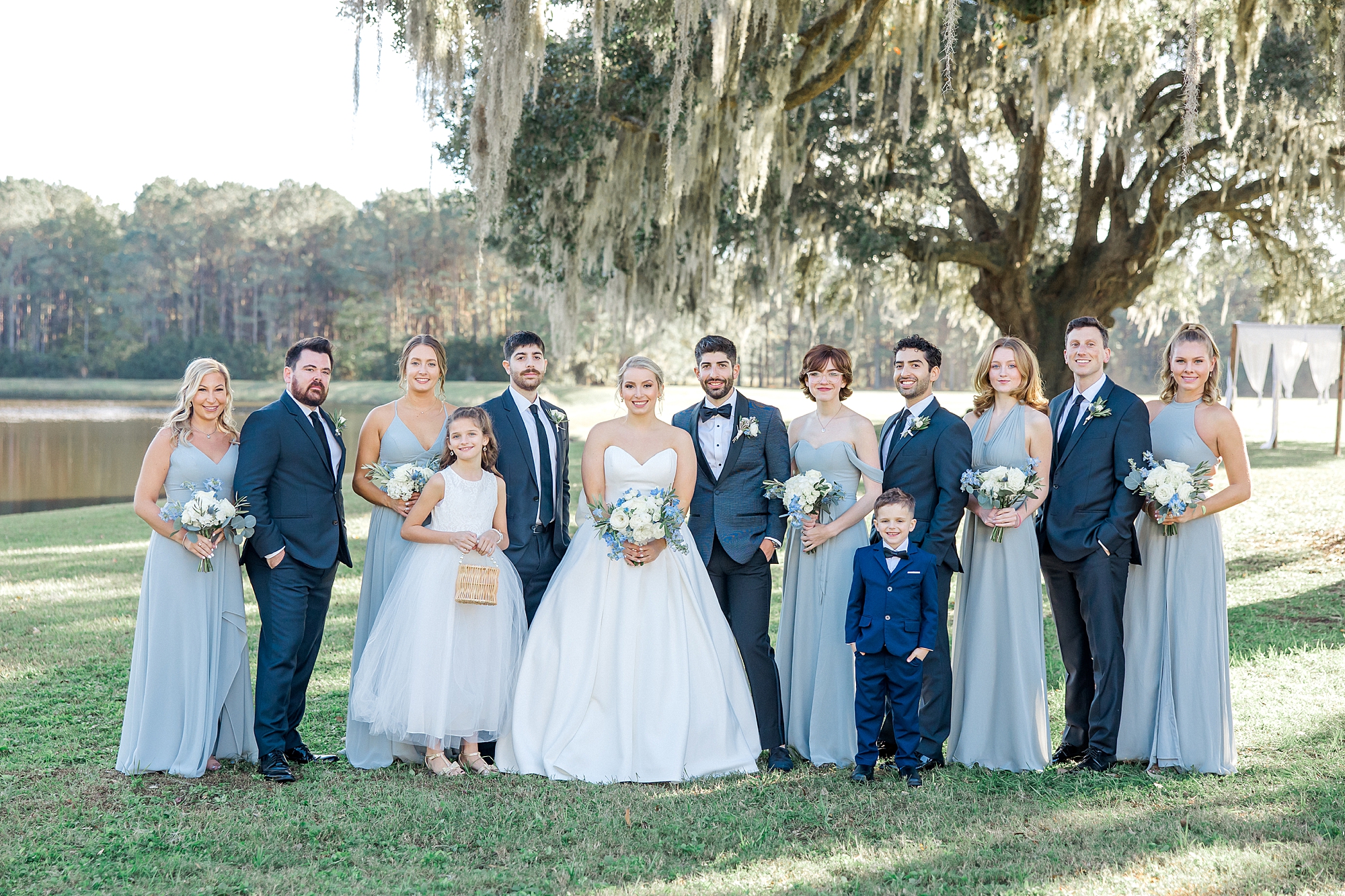 wedding party under the Spanish moss covered oak trees