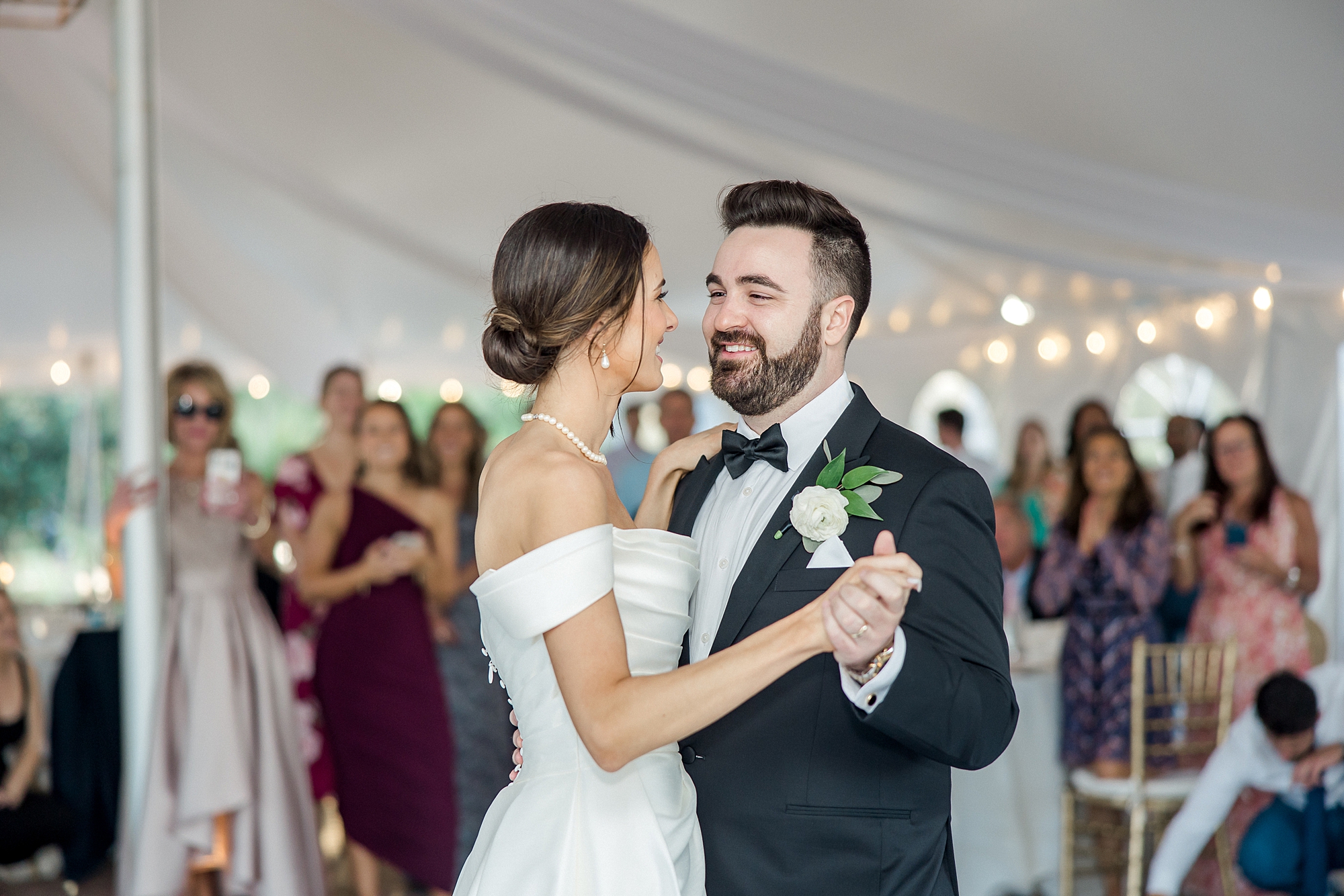 couple dance together at reception