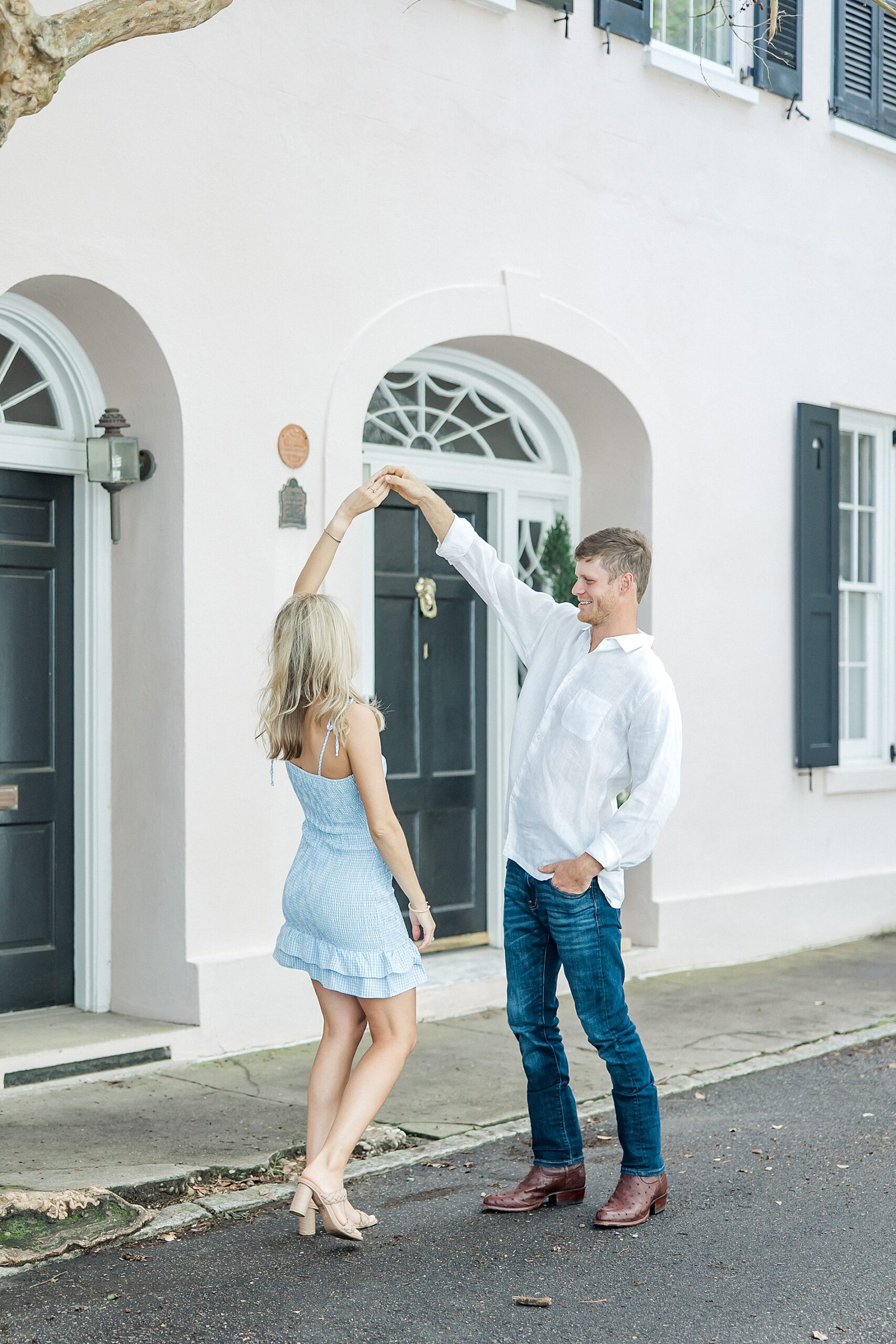 couple dance during Dreamy Downtown Charleston Engagement