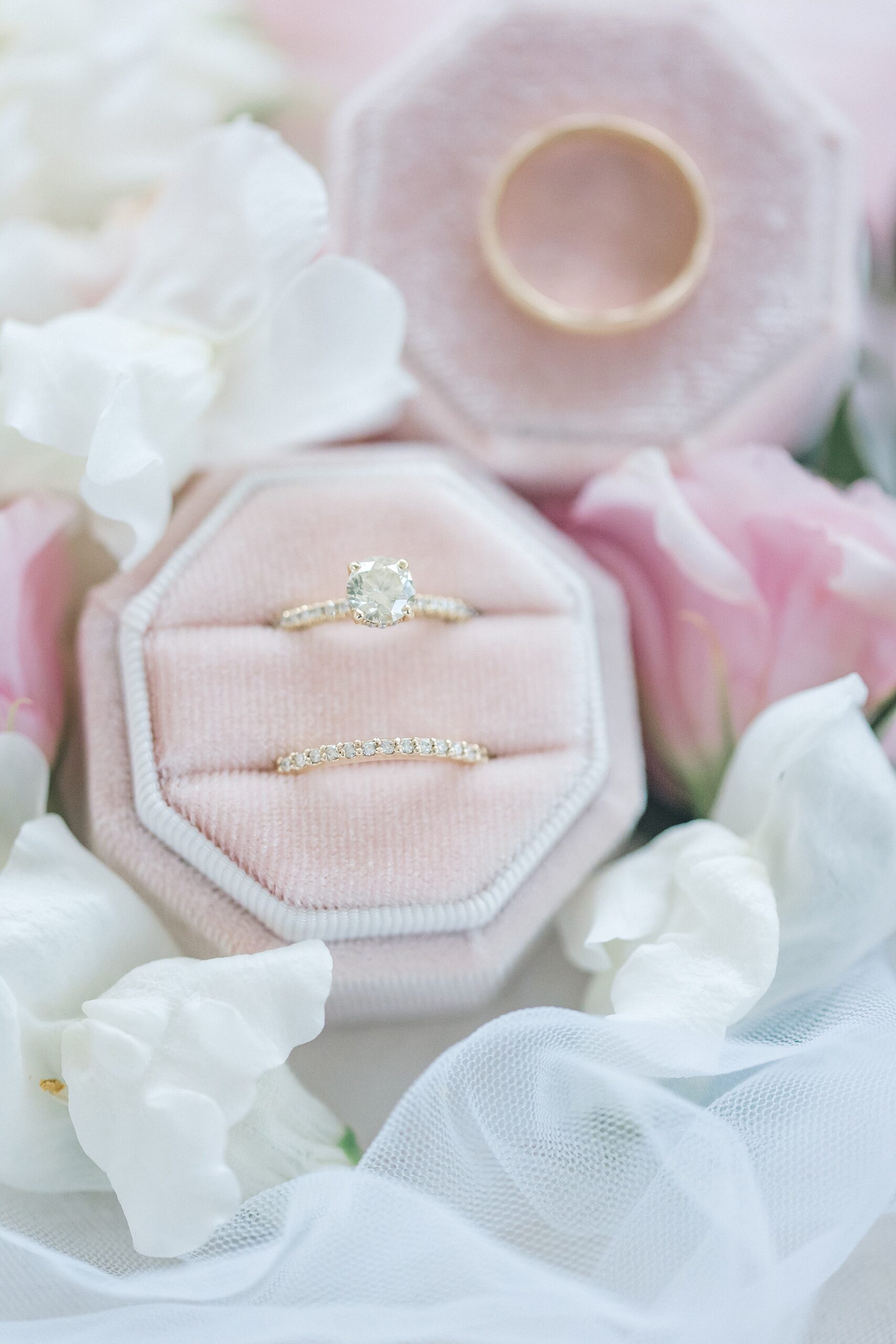 wedding rings in pink ring box