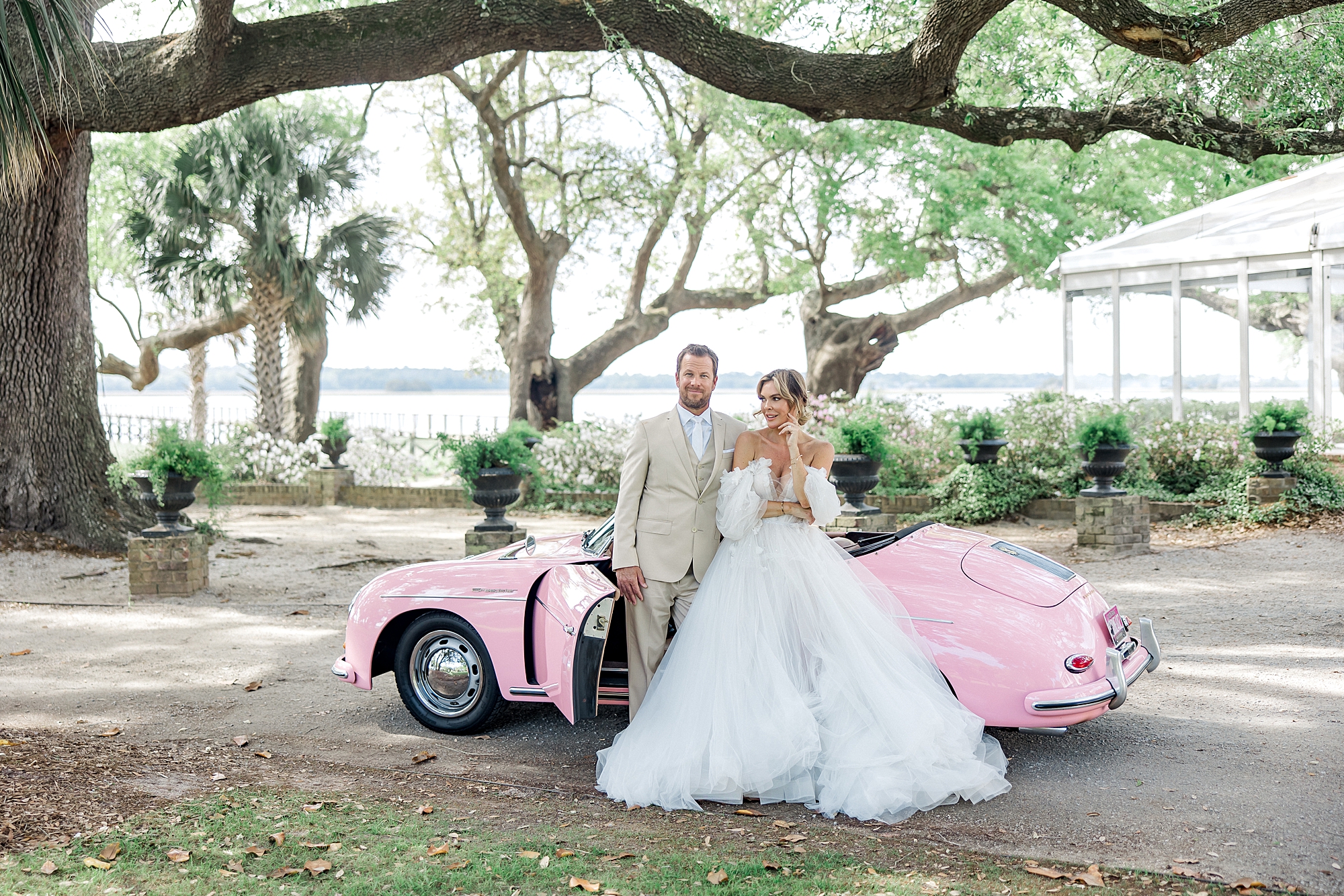 wedding portaits from Luxury Spring Wedding Editorial at Lowndes Grove with vintage pink Porsche