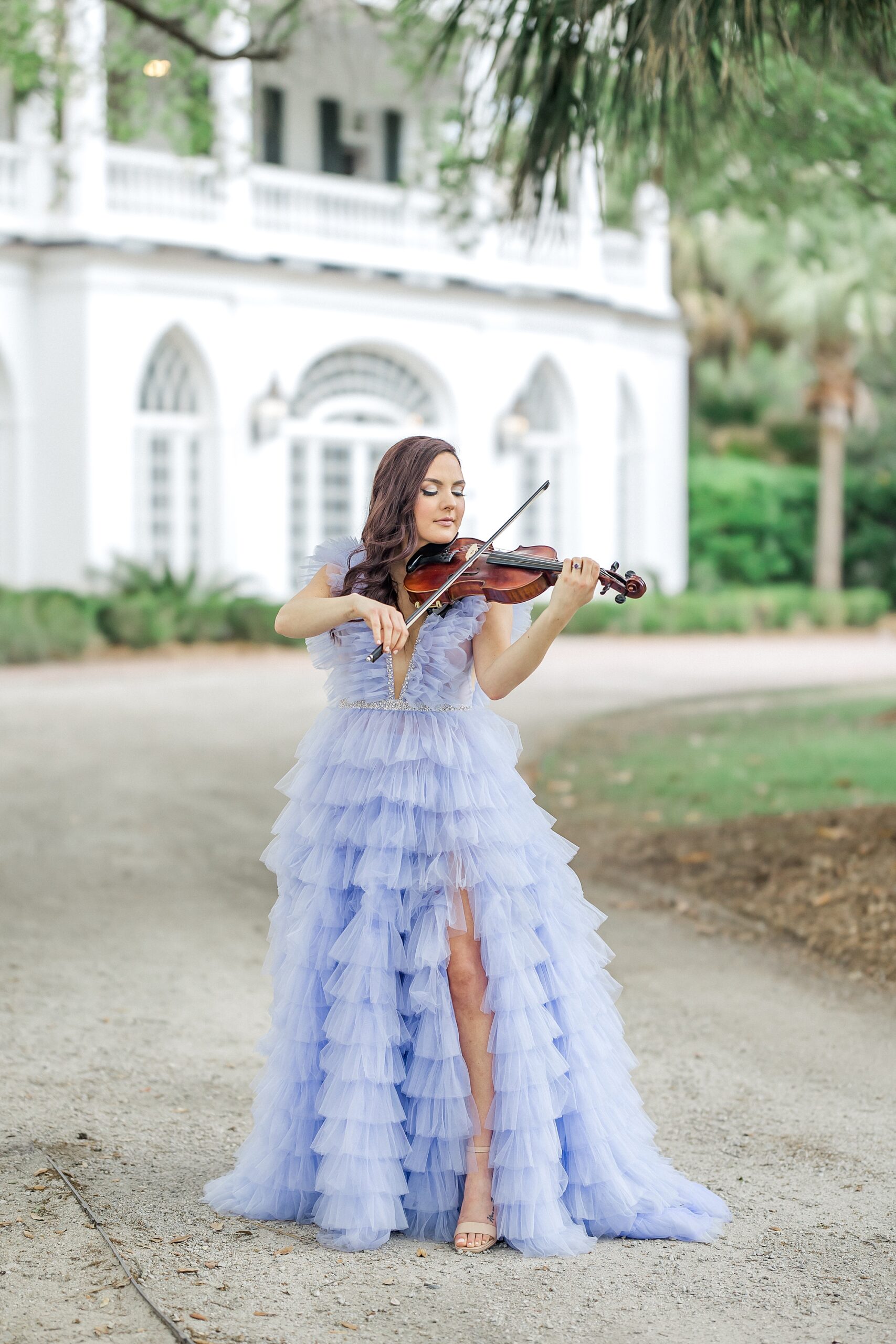 violinist plays at spring wedding at Lowndes Grove in Charleston