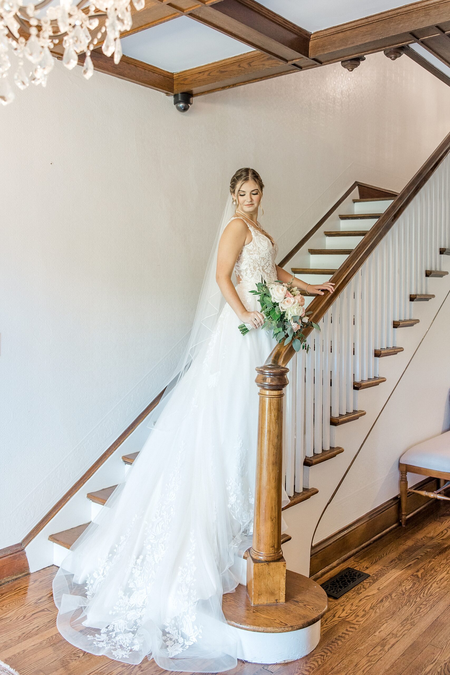 bride ascending up staircase