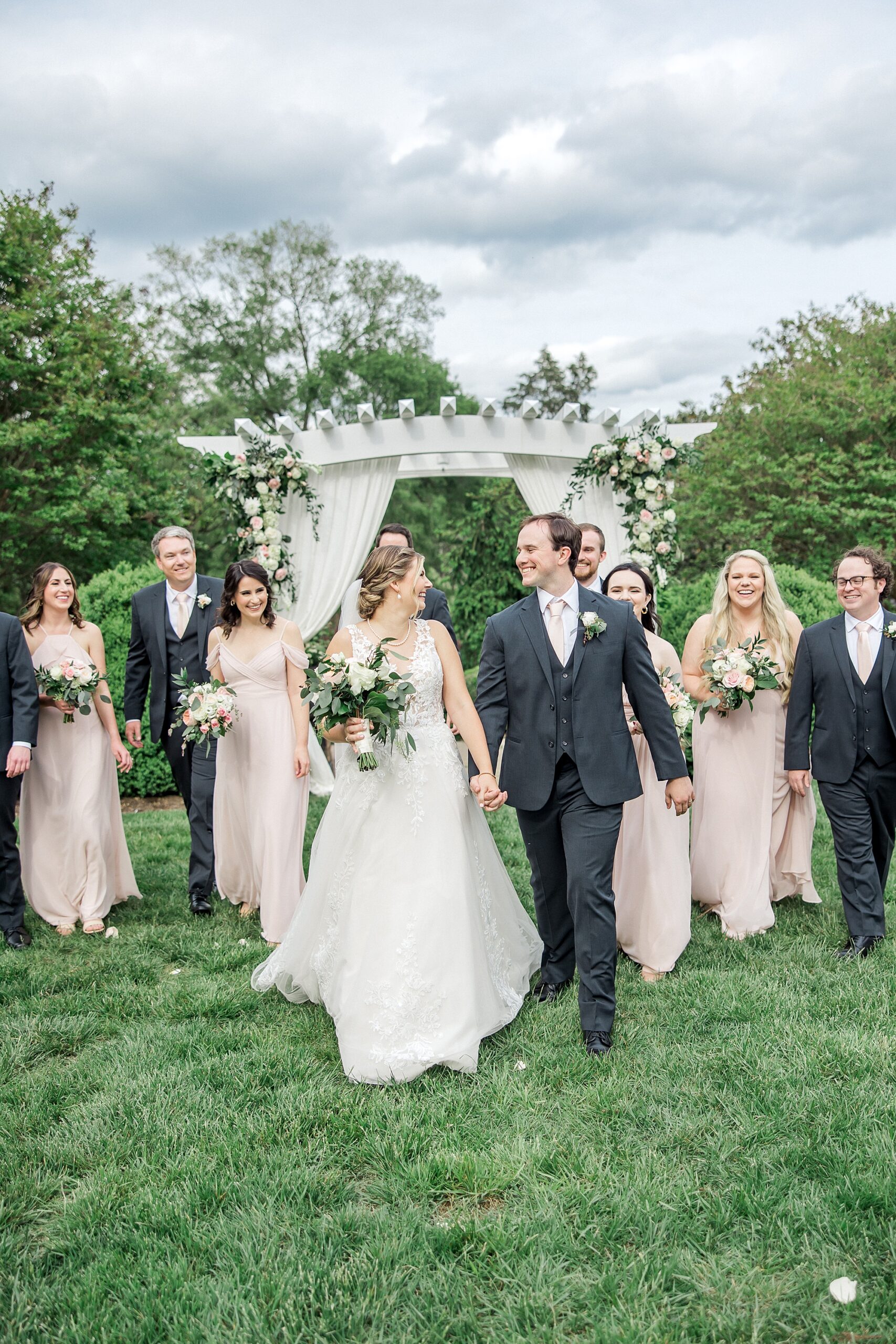 newlyweds with wedding party