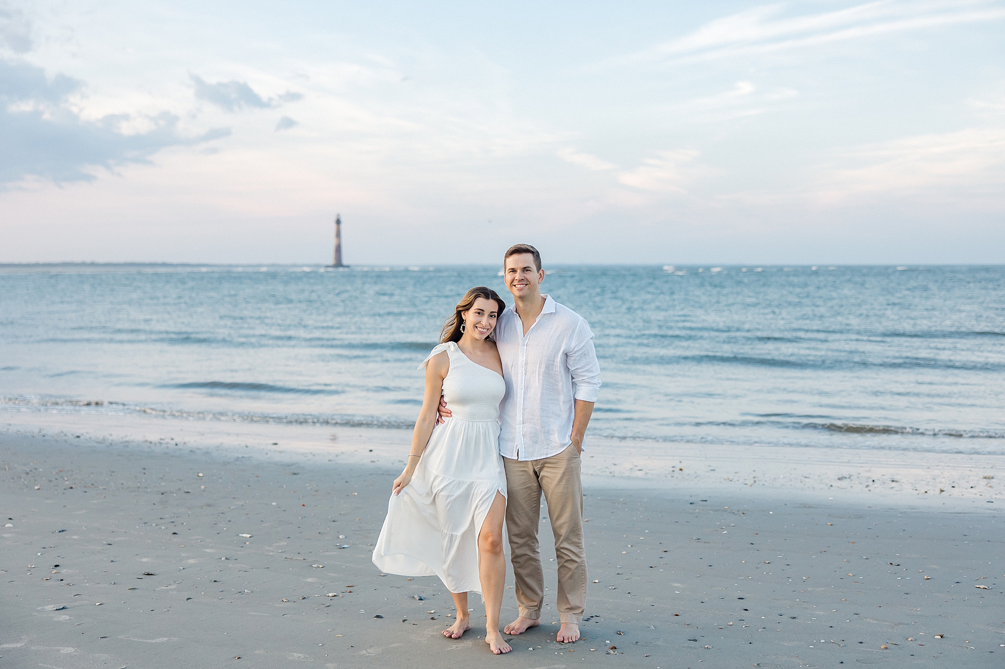 engaged couple on Folly beach during engagement session