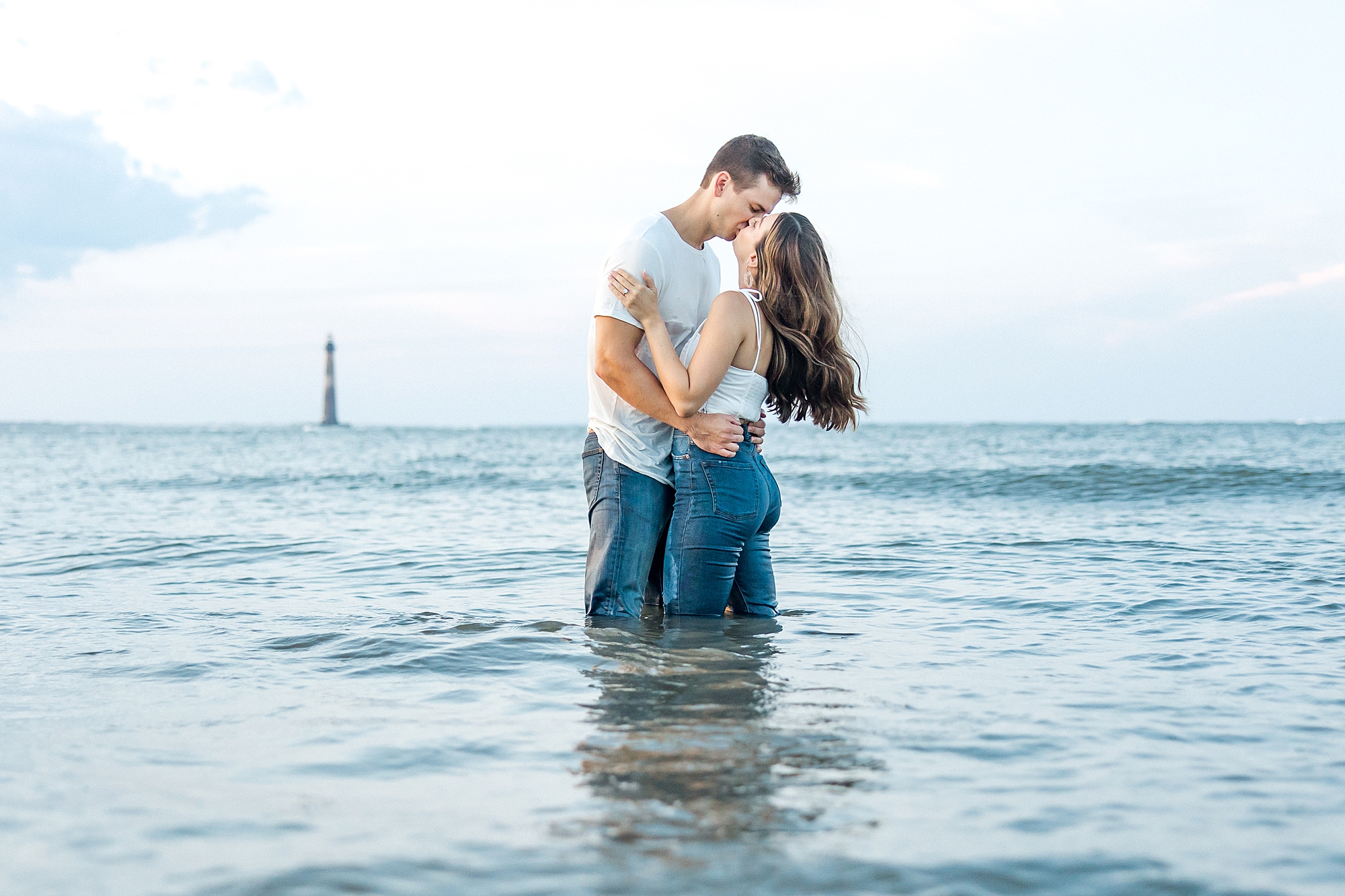 romantic engagement portraits of couple in ocean from Folly Beach Engagement