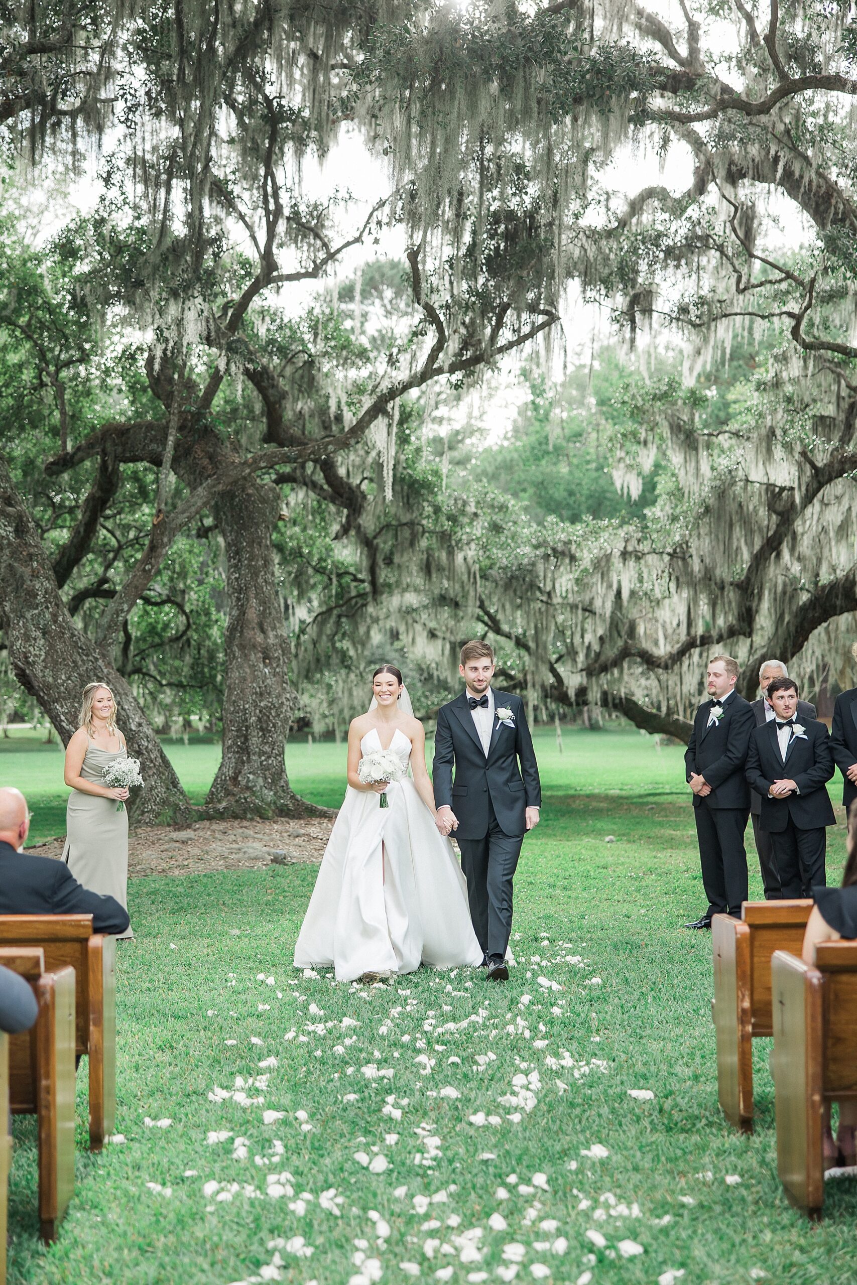 couple exit wedding ceremony