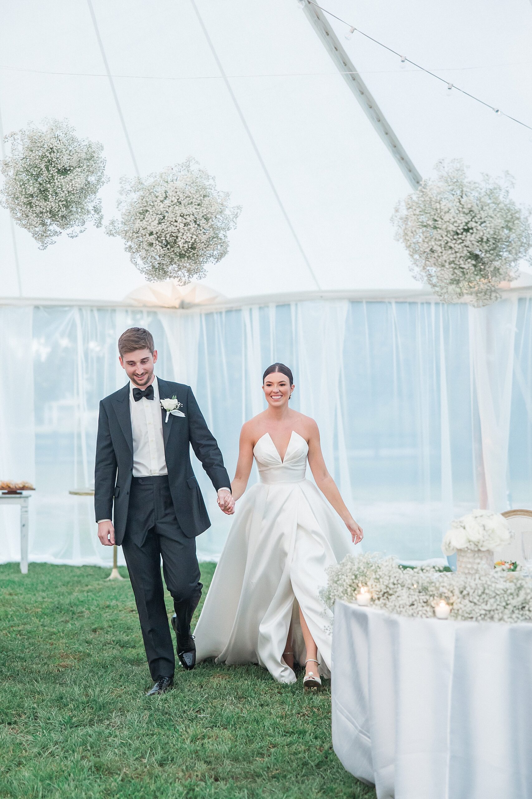 newlyweds enter wedding reception