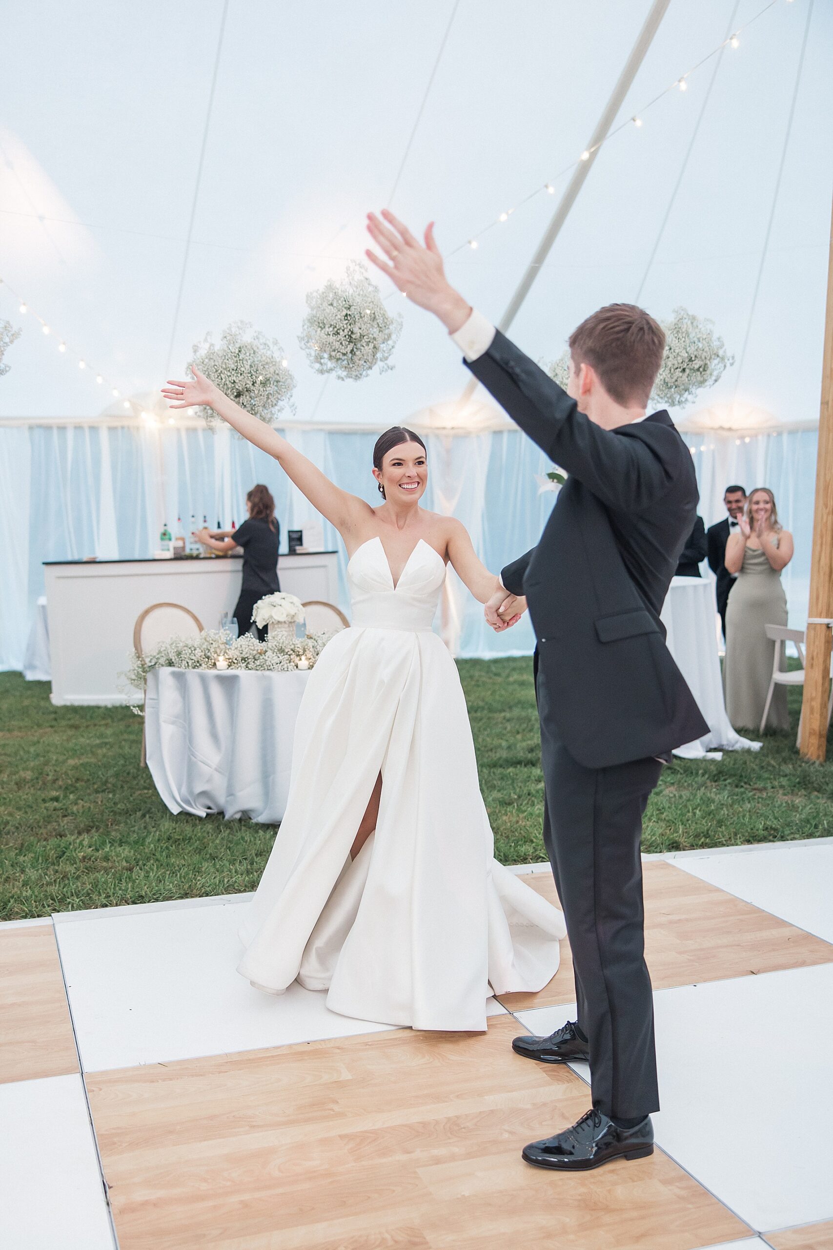 candid first dance portraits of bride and groom