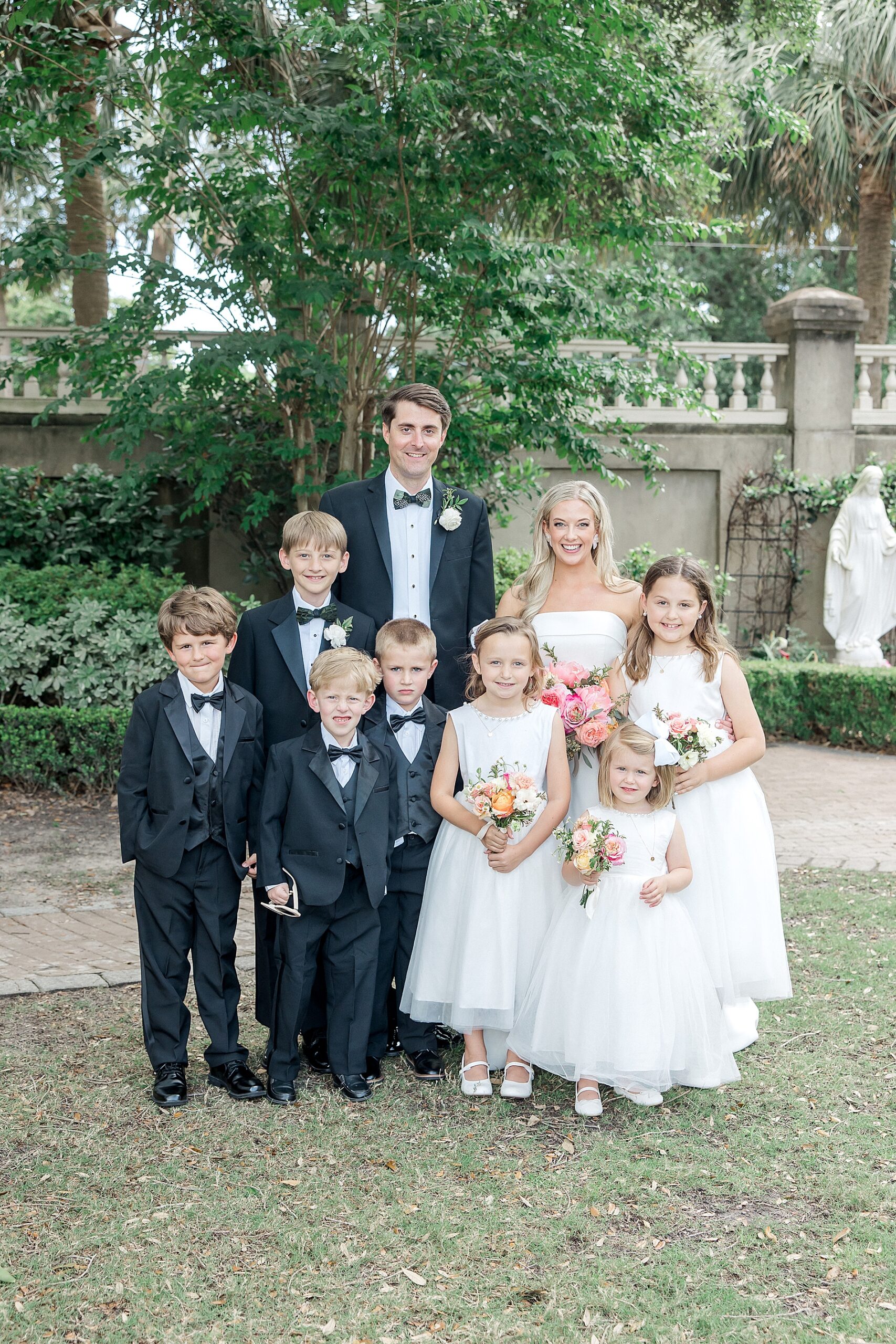 bride and groom with nieces and nephews