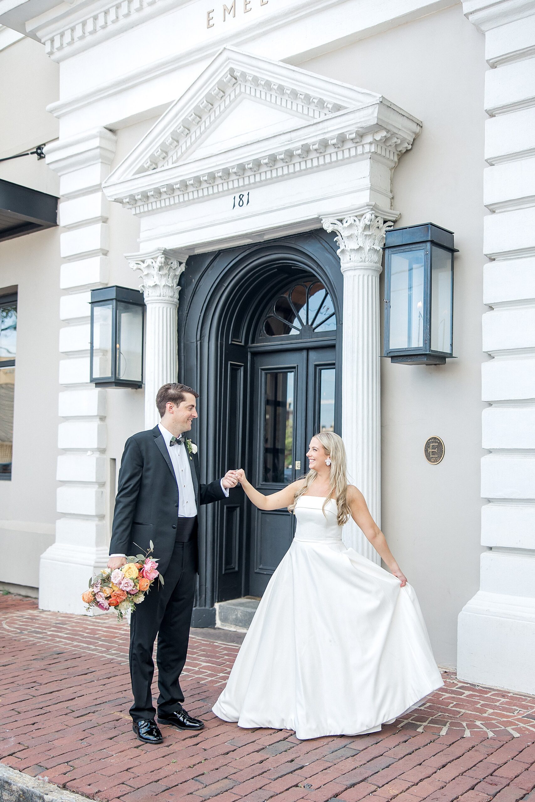 newlyweds dance outside of wedding venue