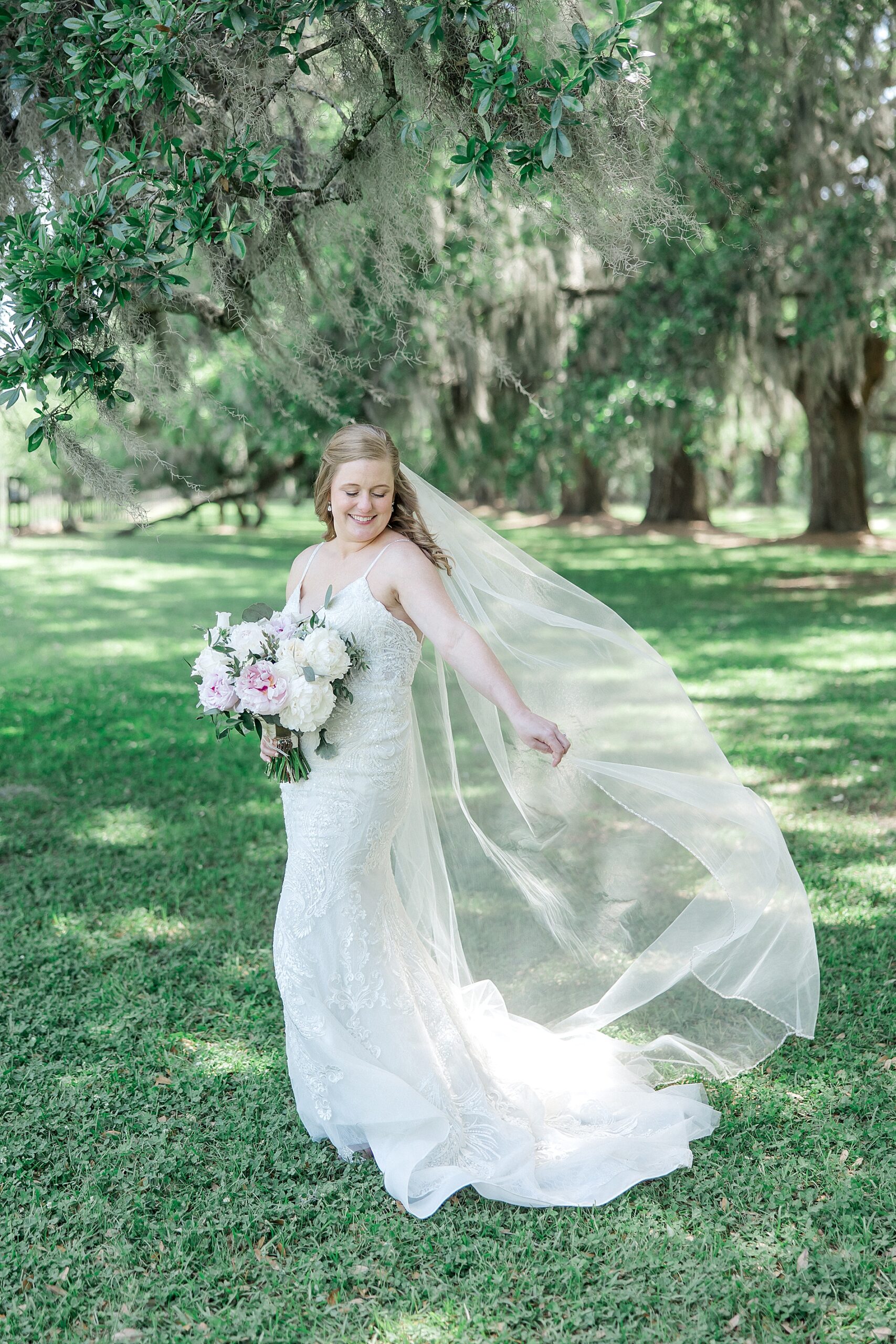 bride twirls in wedding dress from Hampton Park Elopement