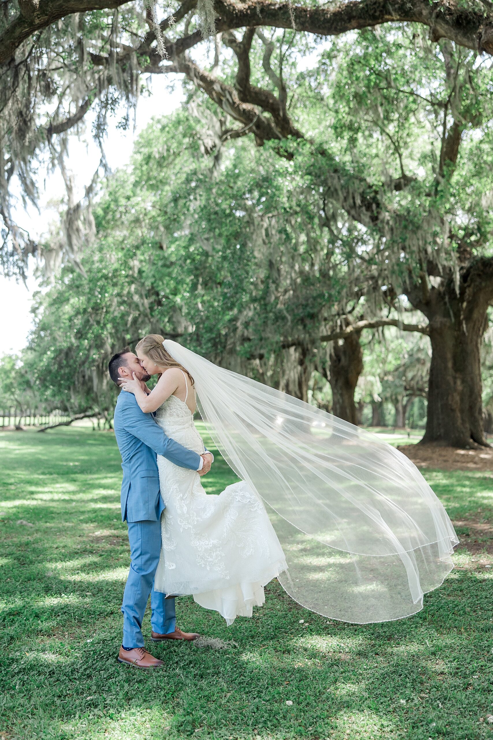 newlyweds kiss during Hampton Park Elopement