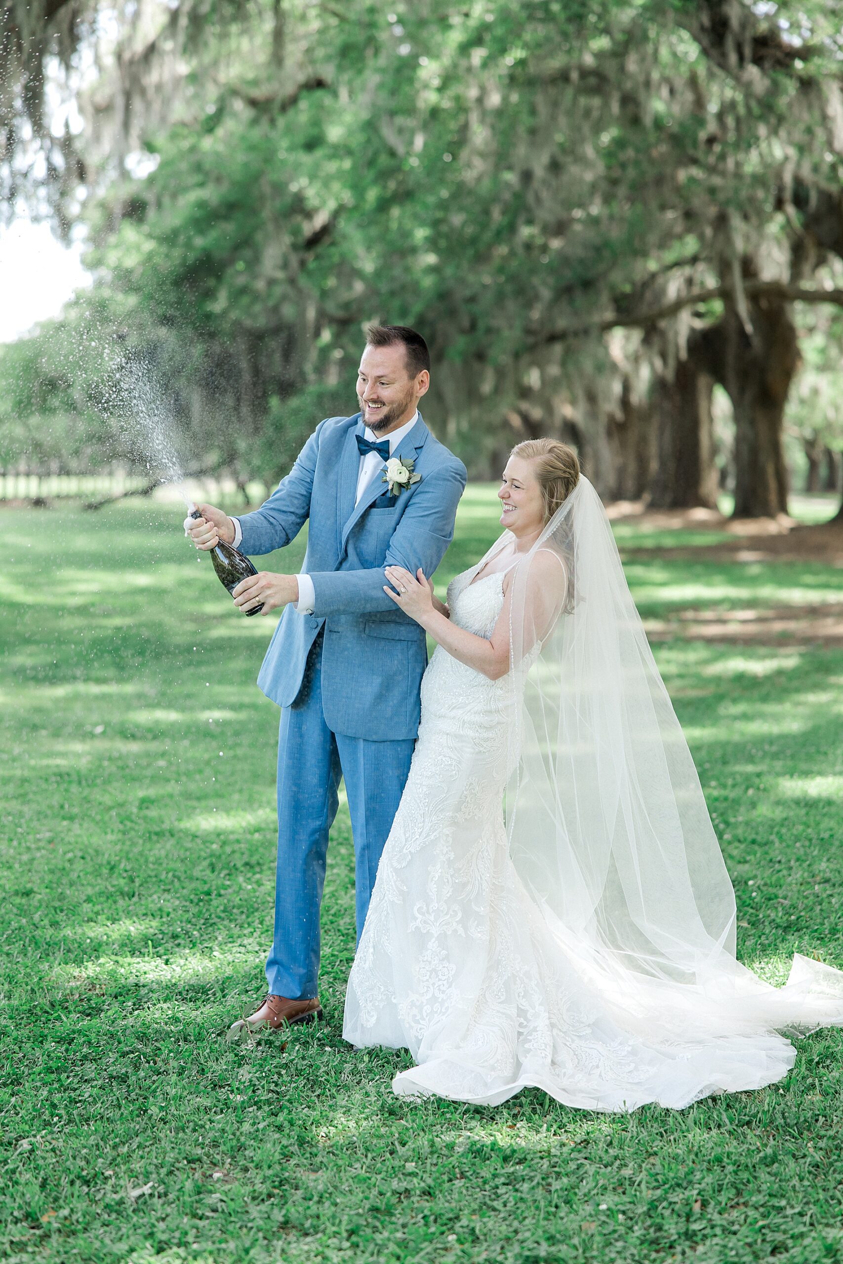 newlyweds toast with champagne