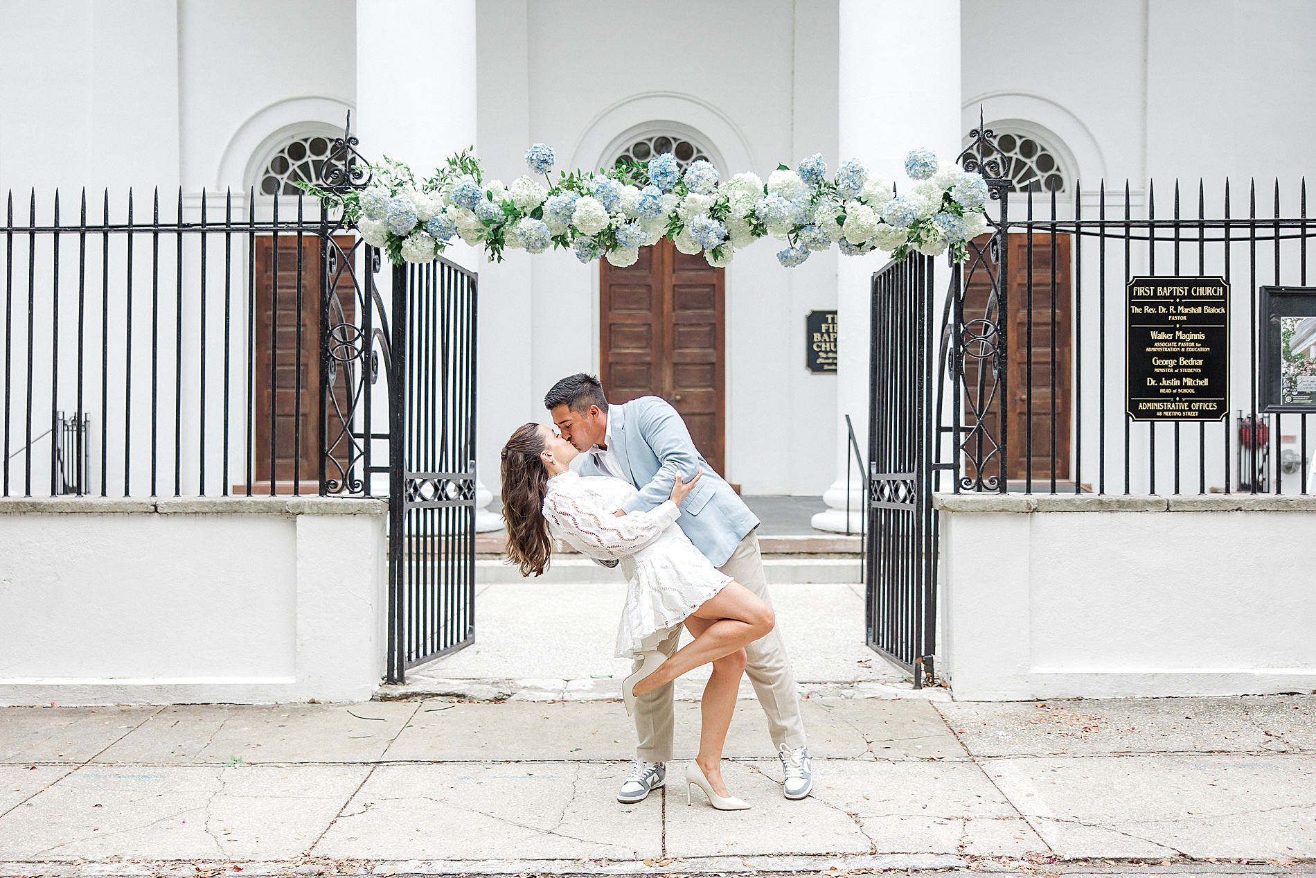 couple kiss during romantic engagement session