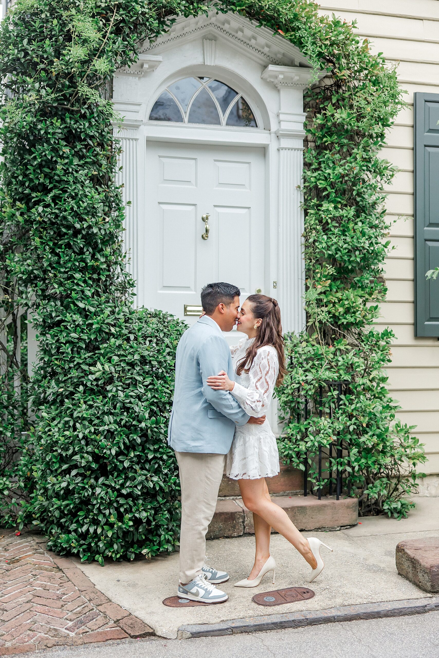 couple kiss outside building