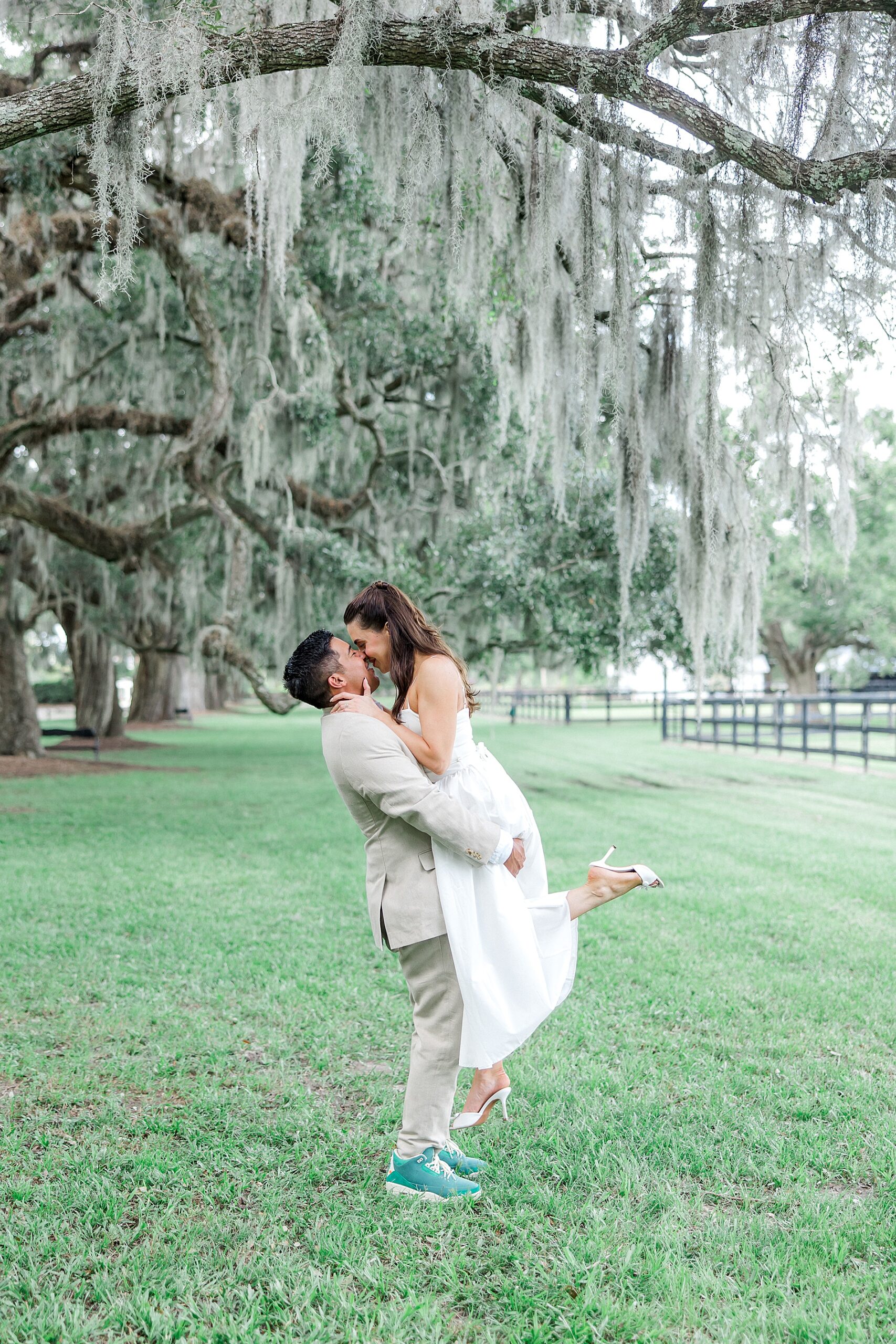 couple kissing during romantic engagement session